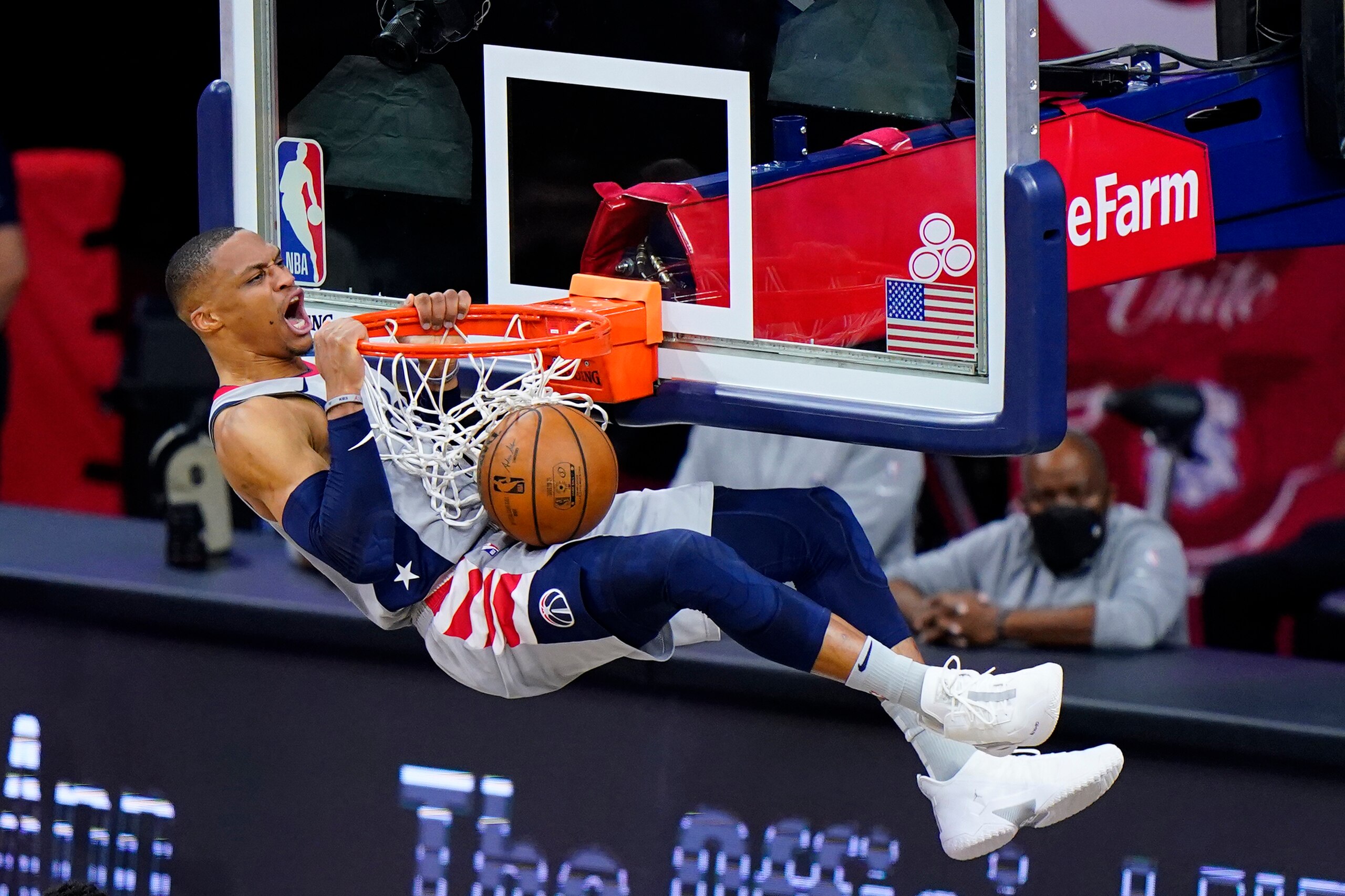 Washington Wizards' Russell Westbrook reacts as he dunks the ball during the first half of Game 2 in a first-round NBA basketball playoff series against the Philadelphia 76ers, Wednesday, May 26, 2021, in Philadelphia. (AP Photo/Matt Slocum)