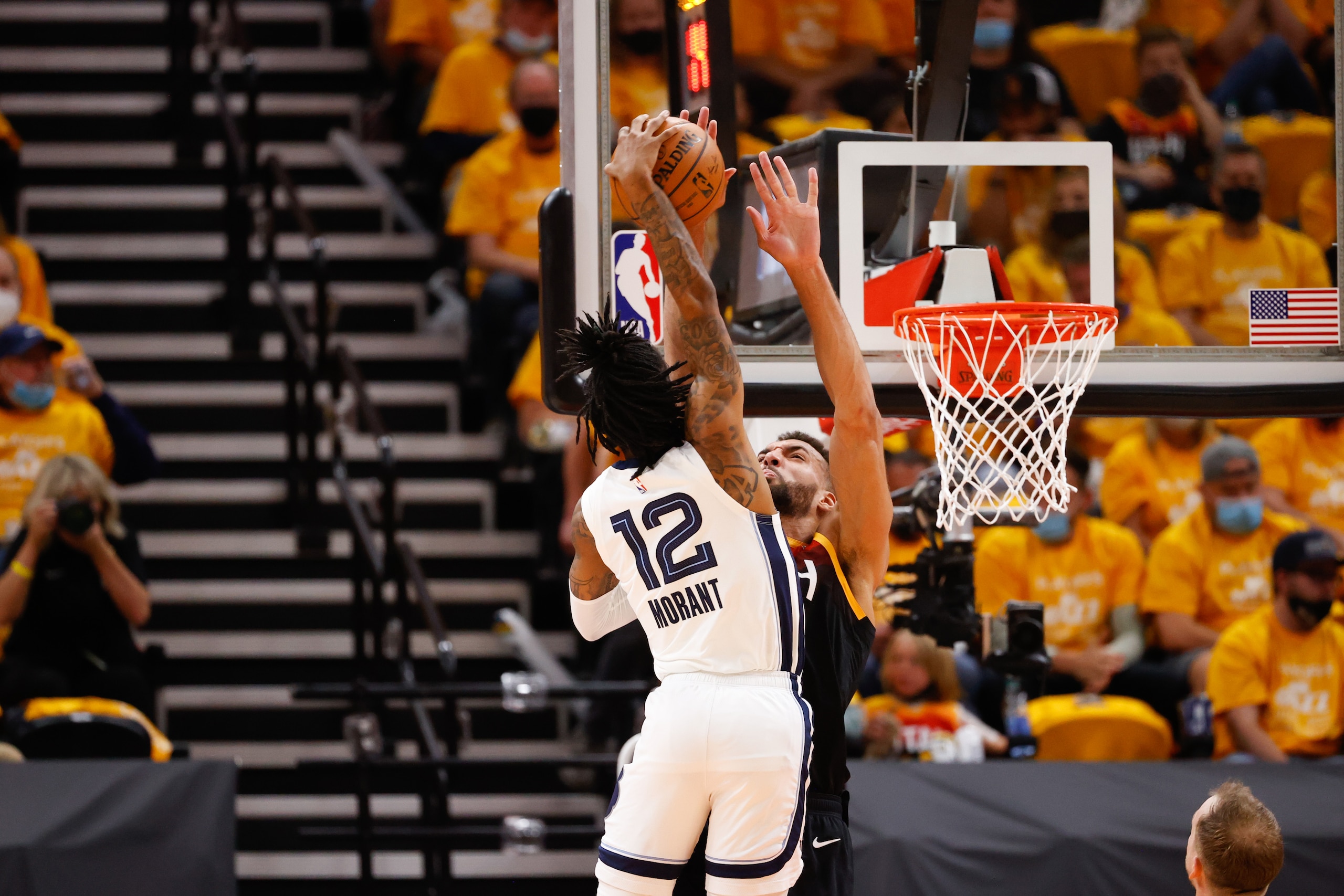 SALT LAKE CITY, UT - MAY 26: Rudy Gobert #27 of the Utah Jazz blocks Ja Morant #12 of the Memphis Grizzlies during the game during Round 1, Game 2 of the 2021 NBA Playoffs on May 26, 2021 at vivint.SmartHome Arena in Salt Lake City, Utah. NOTE TO USER: User expressly acknowledges and agrees that, by downloading and or using this Photograph, User is consenting to the terms and conditions of the Getty Images License Agreement. Mandatory Copyright Notice: Copyright 2021 NBAE (Photo by Jeff Swinger/NBAE via Getty Images) SALT LAKE CITY, UT - MAY 26: Rudy Gobert #27 of the Utah Jazz blocks Ja Morant #12 of the Memphis Grizzlies during the game during Round 1, Game 2 of the 2021 NBA Playoffs on May 26, 2021 at vivint.SmartHome Arena in Salt Lake City, Utah. NOTE TO USER: User expressly acknowledges and agrees that, by downloading and or using this Photograph, User is consenting to the terms and conditions of the Getty Images License Agreement. Mandatory Copyright Notice: Copyright 2021 NBAE (Photo by Jeff Swinger/NBAE via Getty Images)