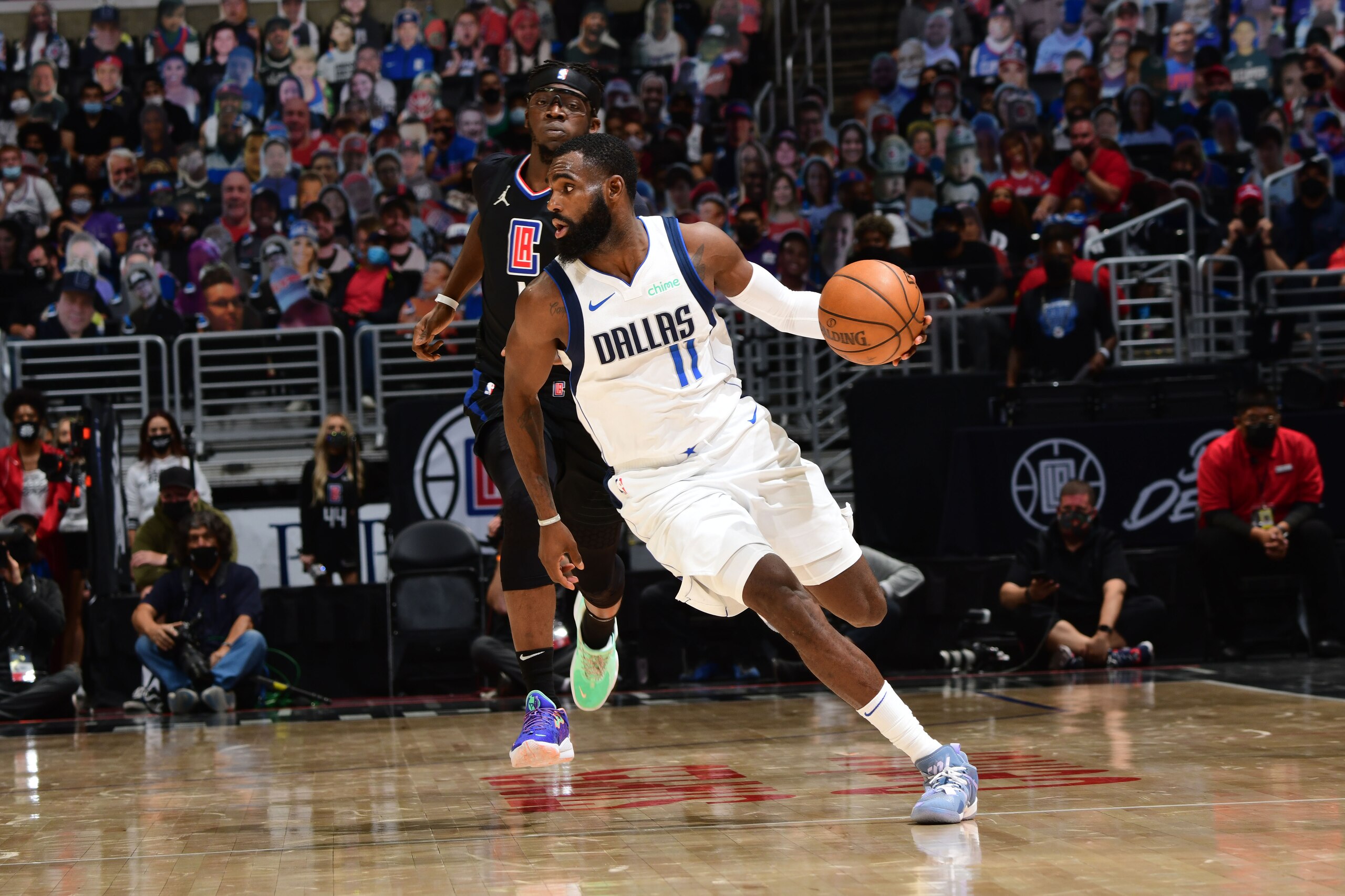 LOS ANGELES, CA - MAY 25: Tim Hardaway Jr. #11 of the Dallas Mavericks dribbles the ball during the game against the LA Clippers during Round 1, Game 2 of the 2021 NBA Playoffs on May 25, 2021 at STAPLES Center in Los Angeles, California. NOTE TO USER: User expressly acknowledges and agrees that, by downloading and/or using this Photograph, user is consenting to the terms and conditions of the Getty Images License Agreement. Mandatory Copyright Notice: Copyright 2021 NBAE (Photo by Adam Pantozzi/NBAE via Getty Images) LOS ANGELES, CA - MAY 25: Tim Hardaway Jr. #11 of the Dallas Mavericks dribbles the ball during the game against the LA Clippers during Round 1, Game 2 of the 2021 NBA Playoffs on May 25, 2021 at STAPLES Center in Los Angeles, California. NOTE TO USER: User expressly acknowledges and agrees that, by downloading and/or using this Photograph, user is consenting to the terms and conditions of the Getty Images License Agreement. Mandatory Copyright Notice: Copyright 2021 NBAE (Photo by Adam Pantozzi/NBAE via Getty Images)