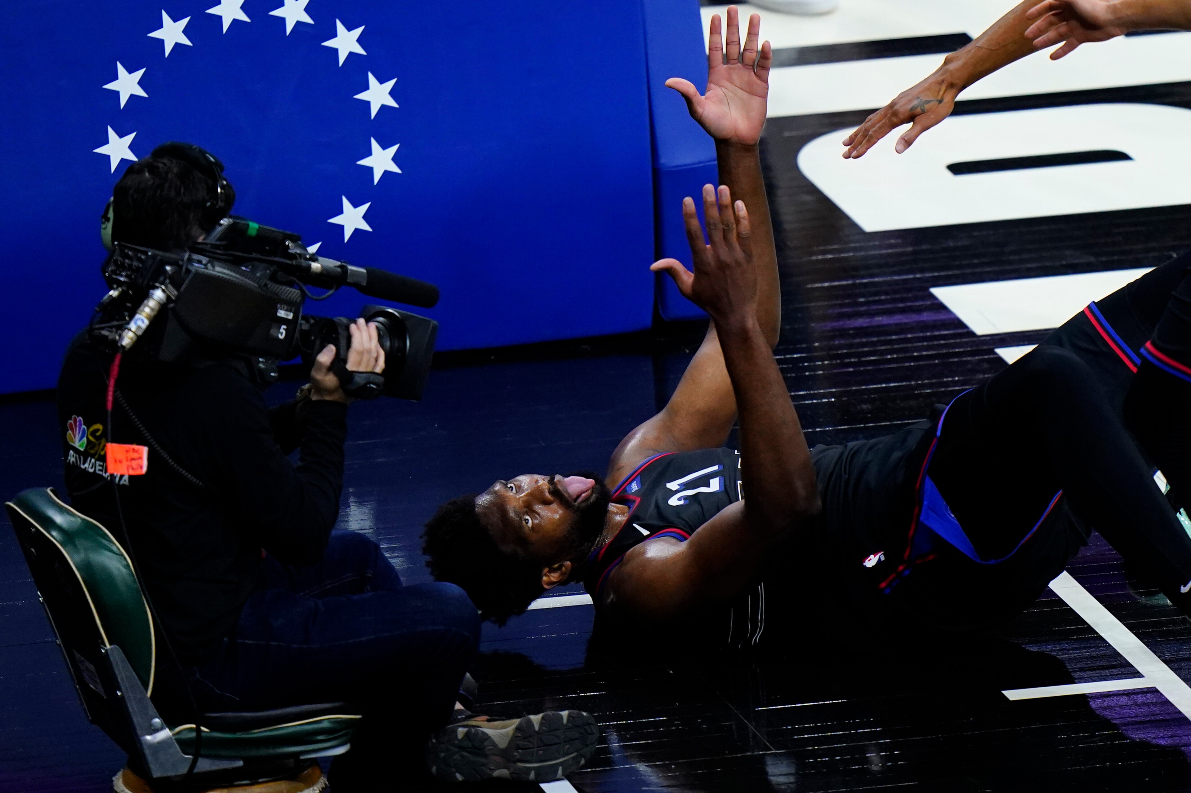Philadelphia 76ers' Joel Embiid reacts after being fouled during the first half of Game 2 in a first-round NBA basketball playoff series against the Washington Wizards, Wednesday, May 26, 2021, in Philadelphia. (AP Photo/Matt Slocum) Philadelphia 76ers' Joel Embiid reacts after being fouled during the first half of Game 2 in a first-round NBA basketball playoff series against the Washington Wizards, Wednesday, May 26, 2021, in Philadelphia. (AP Photo/Matt Slocum)