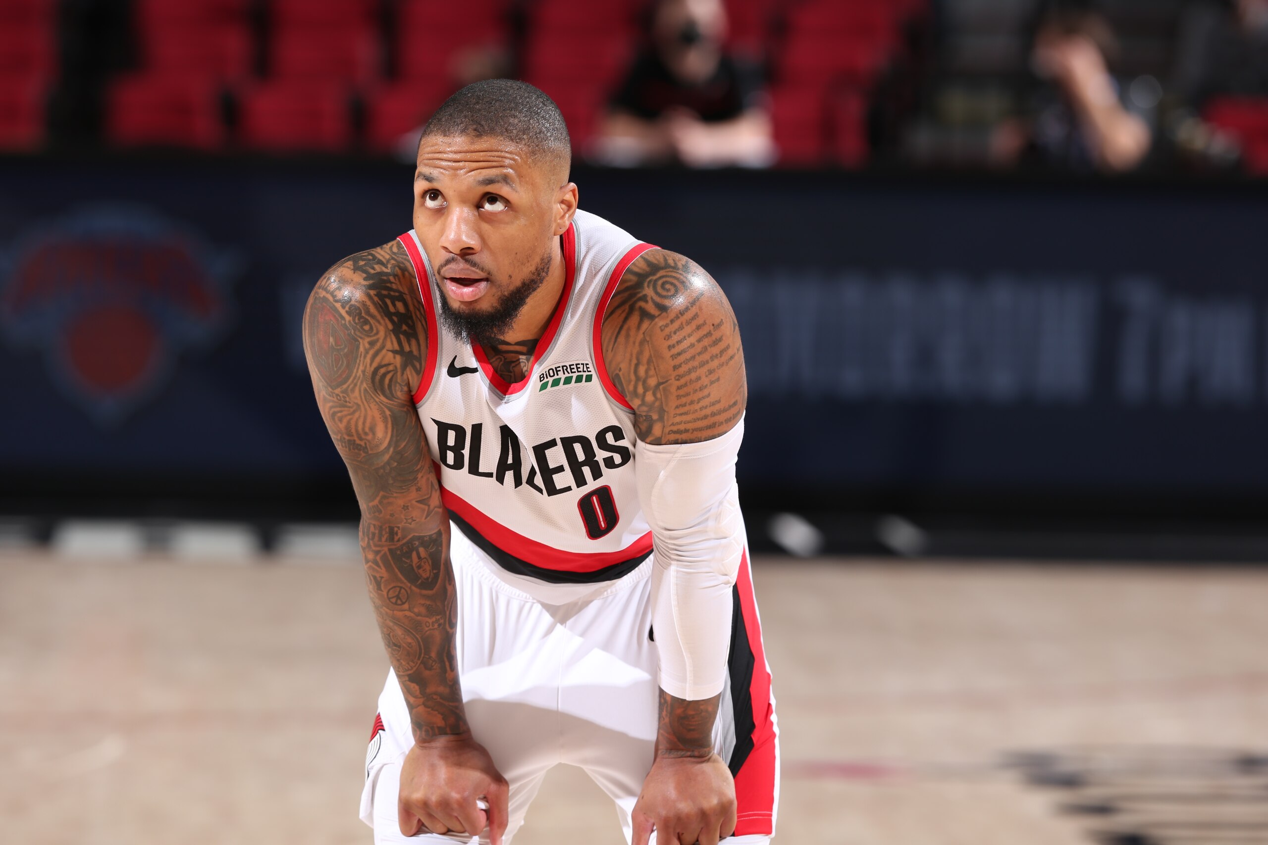 PORTLAND, OR - MAY 27: Damian Lillard #0 of the Portland Trail Blazers looks on during Round 1, Game 2 of the 2021 NBA Playoffs on May 27, 2021 at the Moda Center Arena in Portland, Oregon. NOTE TO USER: User expressly acknowledges and agrees that, by downloading and or using this photograph, user is consenting to the terms and conditions of the Getty Images License Agreement. Mandatory Copyright Notice: Copyright 2021 NBAE (Photo by Sam Forencich/NBAE via Getty Images)