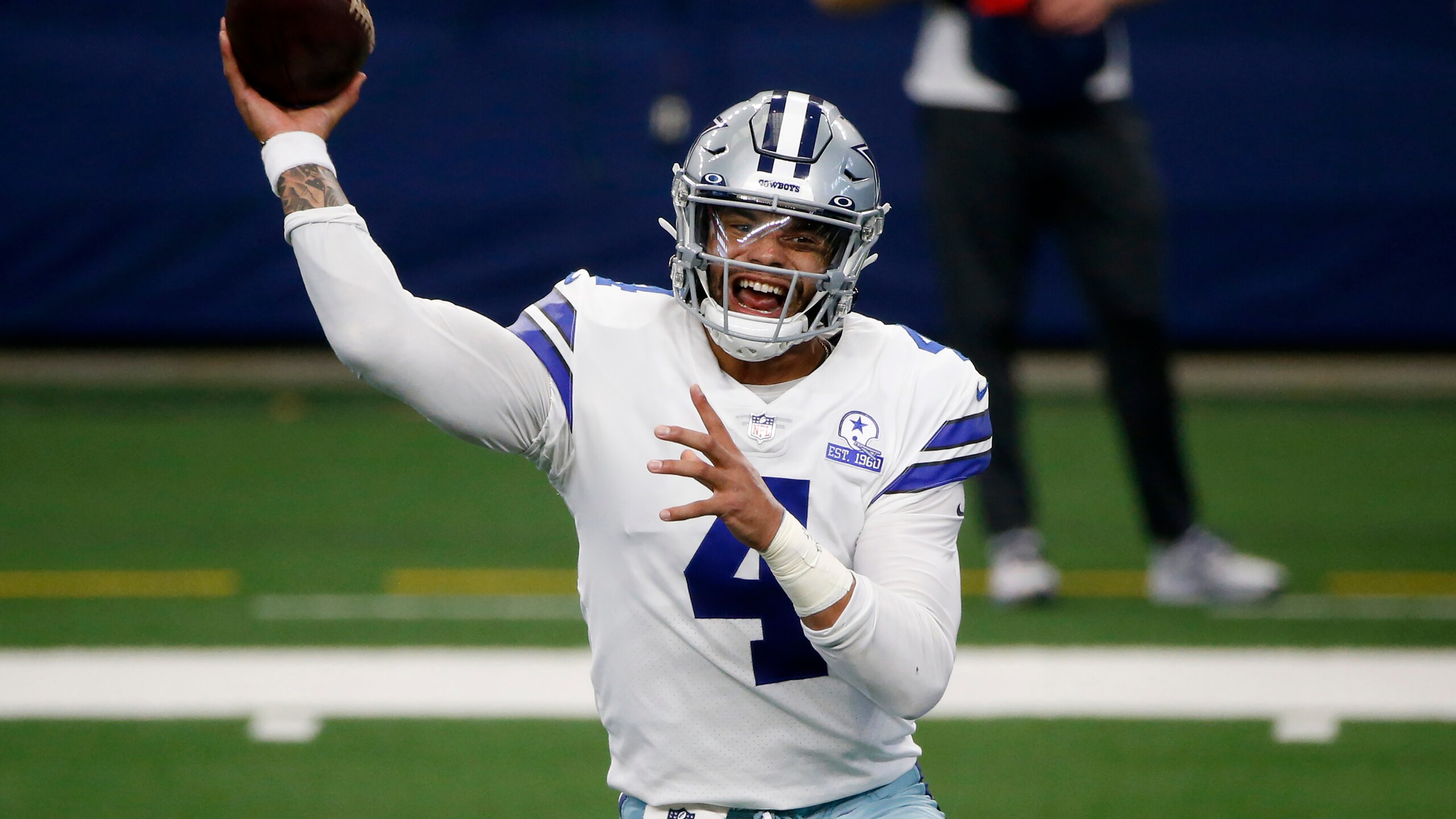 Dallas Cowboys quarterback Dak Prescott (4) throws against the New York Giants during the first half of an NFL Football game in Arlington, Texas, Sunday, Oct. 11, 2020. (AP Photo/Michael Ainsworth)