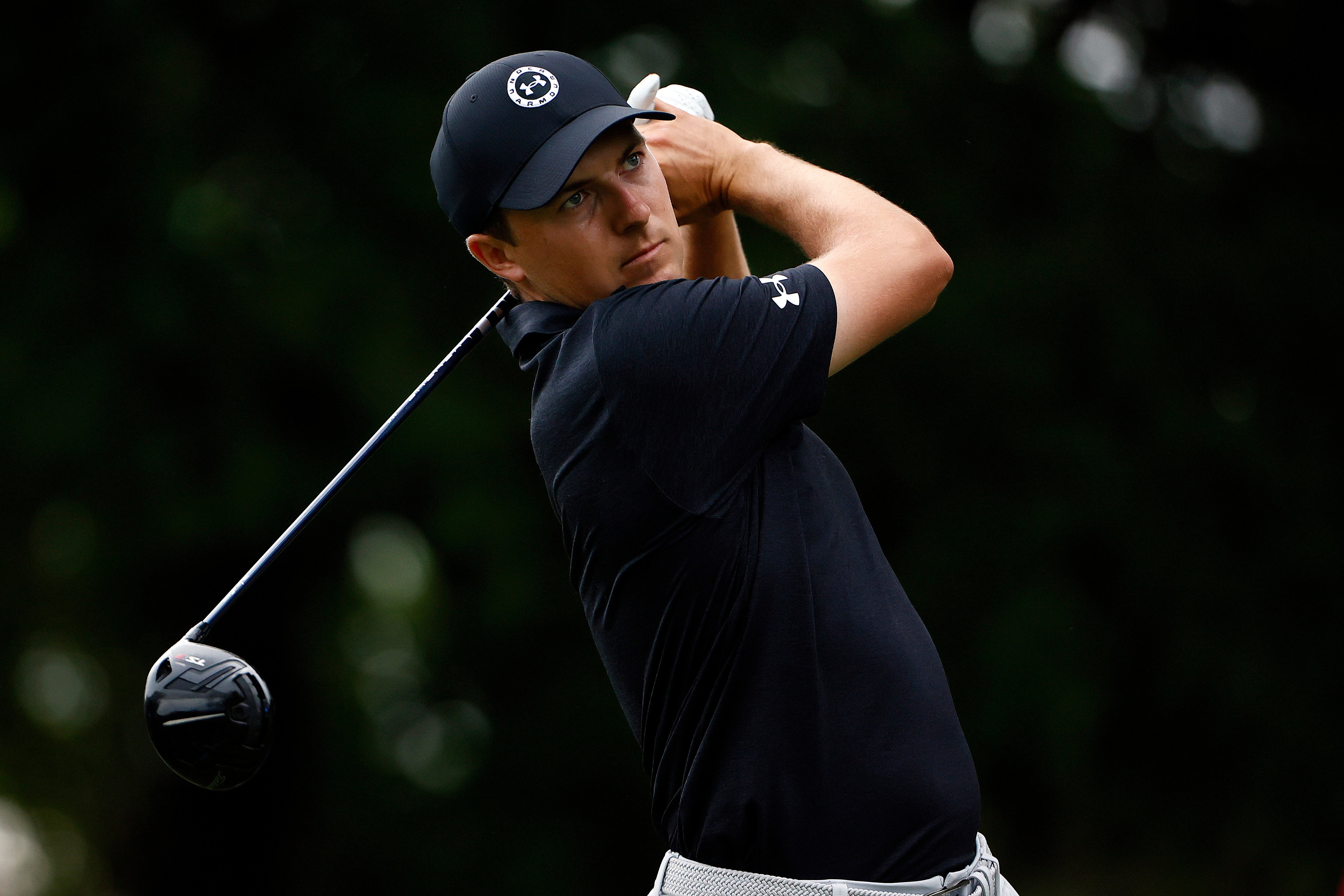 FORT WORTH, TEXAS - MAY 28: Jordan Spieth hits his tee shot on the ninth hole during the second round of the Charles Schwab Challenge at Colonial Country Club on May 28, 2021 in Fort Worth, Texas. (Photo by Tom Pennington/Getty Images)