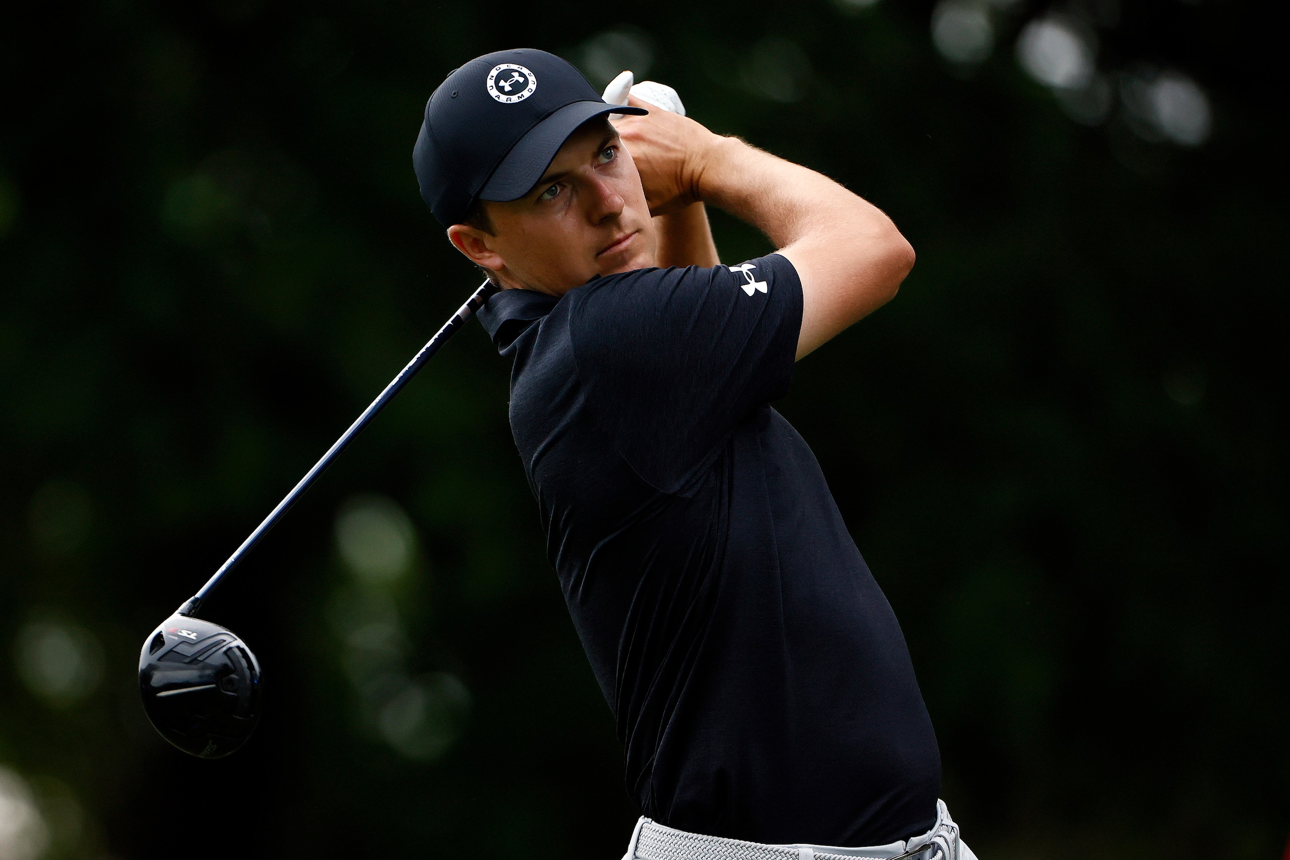 FORT WORTH, TEXAS - MAY 28: Jordan Spieth hits his tee shot on the ninth hole during the second round of the Charles Schwab Challenge at Colonial Country Club on May 28, 2021 in Fort Worth, Texas. (Photo by Tom Pennington/Getty Images)