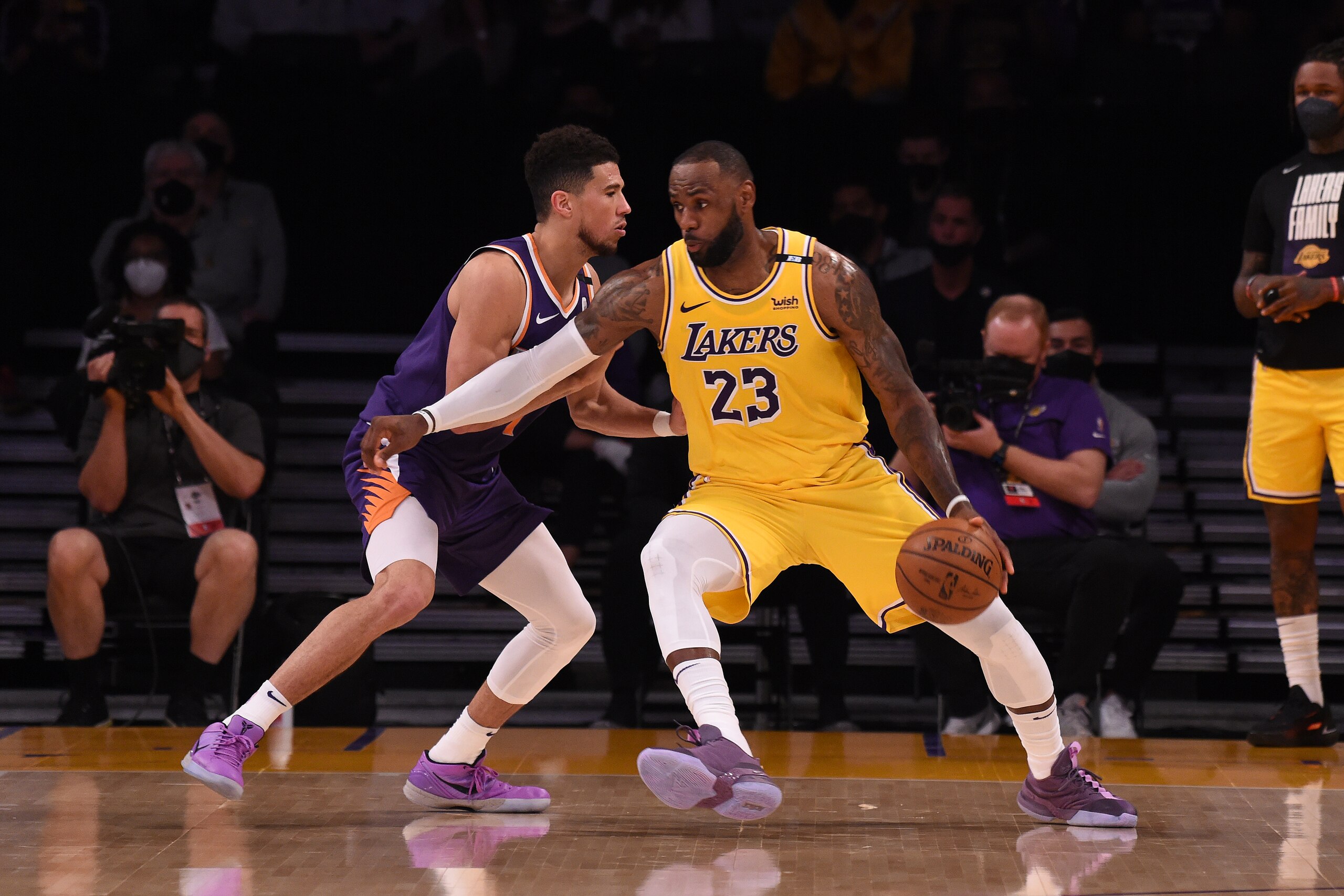 LOS ANGELES, CA - MAY 27: LeBron James #23 of the Los Angeles Lakers handles the ball against the Phoenix Suns during Round 1, Game 3 of the 2021 NBA Playoffs on May 27, 2021 at STAPLES Center in Los Angeles, California. NOTE TO USER: User expressly acknowledges and agrees that, by downloading and/or using this Photograph, user is consenting to the terms and conditions of the Getty Images License Agreement. Mandatory Copyright Notice: Copyright 2021 NBAE (Photo by Juan Ocampo/NBAE via Getty Images)