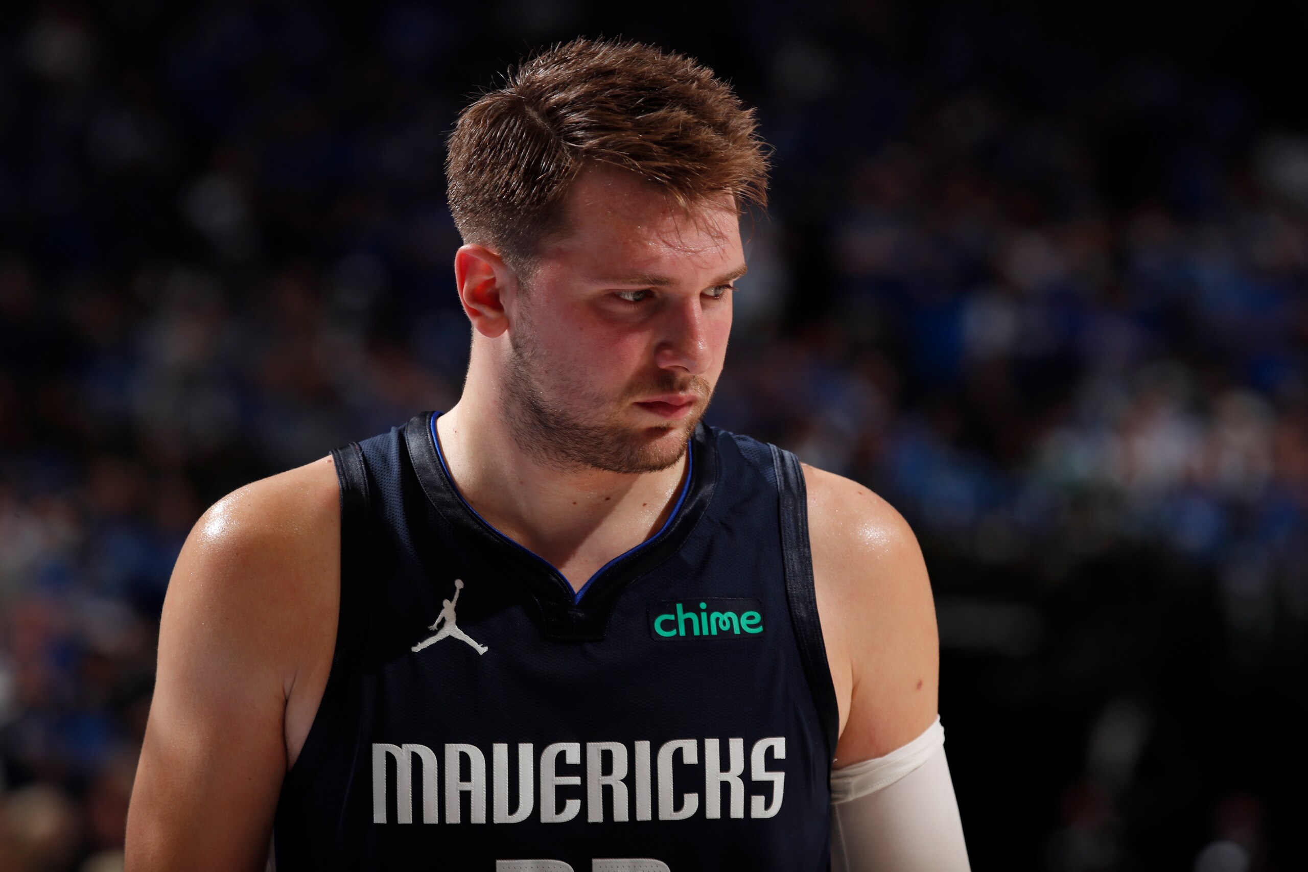 DALLAS, TX - MAY 28: Luka Doncic #77 of the Dallas Mavericks looks on during the game against the LA Clippers during Round 1, Game 3 of the 2021 NBA Playoffs on May 28, 2021 at the American Airlines Center in Dallas, Texas. NOTE TO USER: User expressly acknowledges and agrees that, by downloading and or using this photograph, User is consenting to the terms and conditions of the Getty Images License Agreement. Mandatory Copyright Notice: Copyright 2021 NBAE (Photo by Jeff Haynes/NBAE via Getty Images)