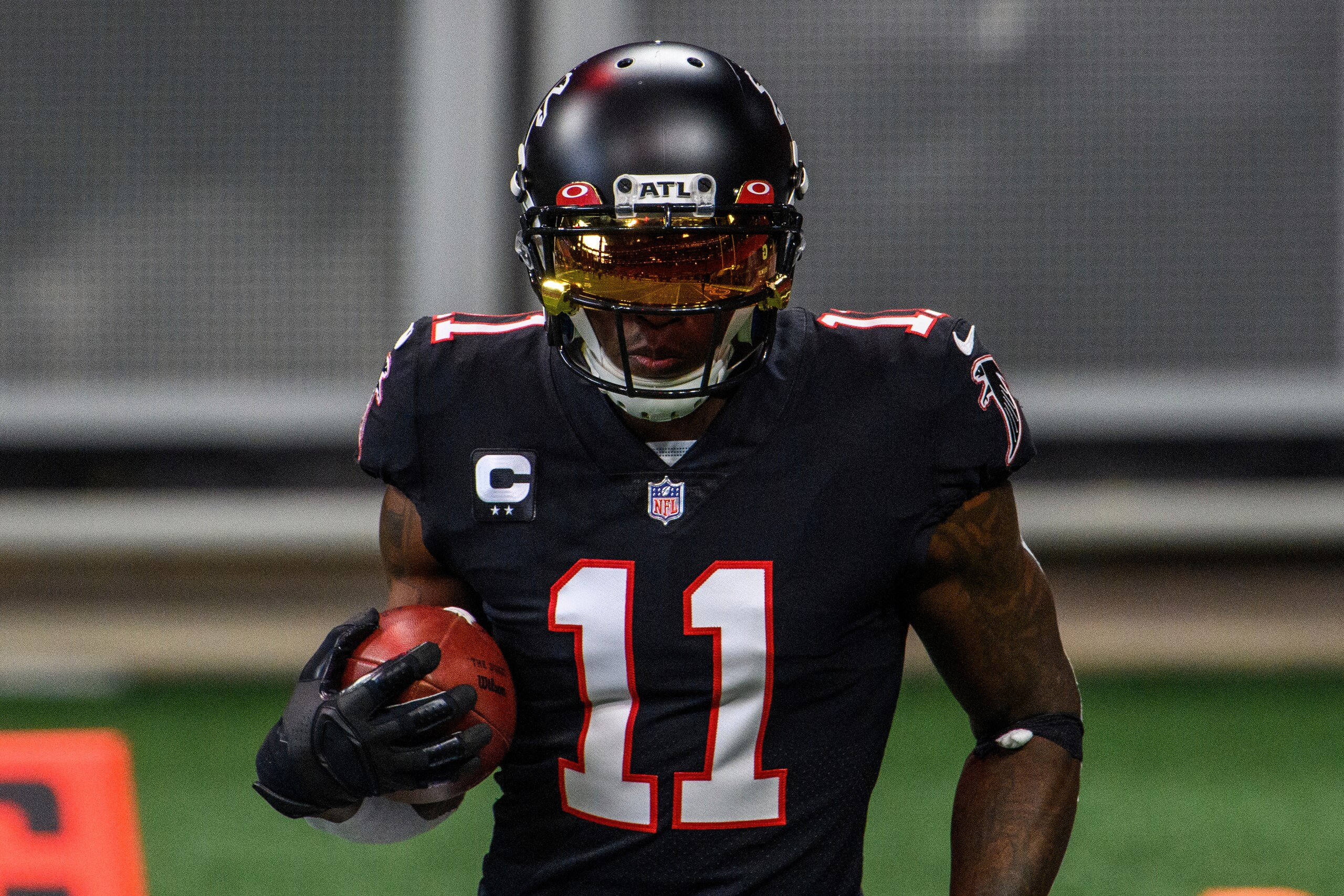 Atlanta Falcons wide receiver Julio Jones (11) warms up before an NFL football game against the New Orleans Saints, Sunday, Dec. 6, 2020, in Atlanta. The New Orleans Saints won 21-16. (AP Photo/Danny Karnik)