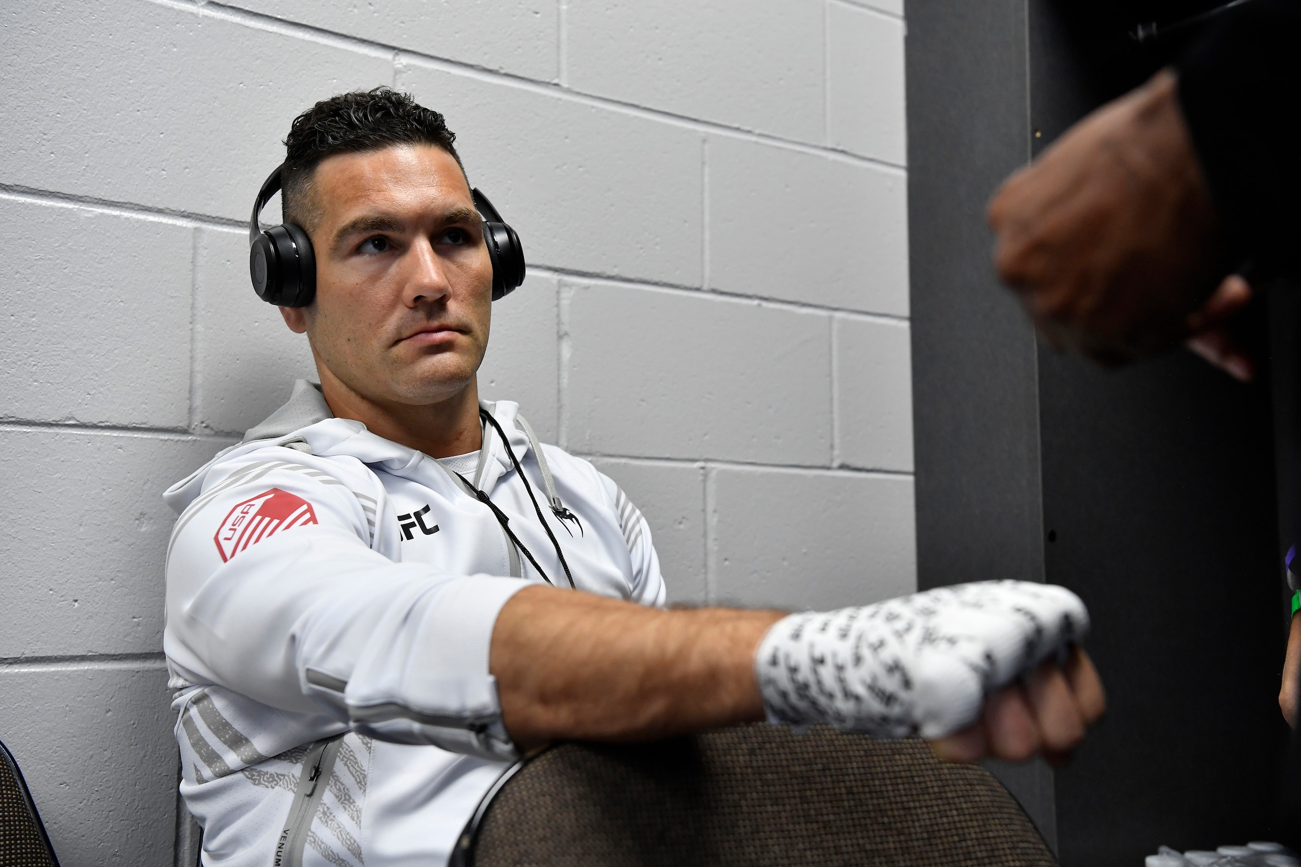 JACKSONVILLE, FLORIDA - APRIL 24: Chris Weidman gets his hands wrapped backstage during the UFC 261 event at VyStar Veterans Memorial Arena on April 24, 2021 in Jacksonville, Florida. (Photo by Mike Roach/Zuffa LLC)