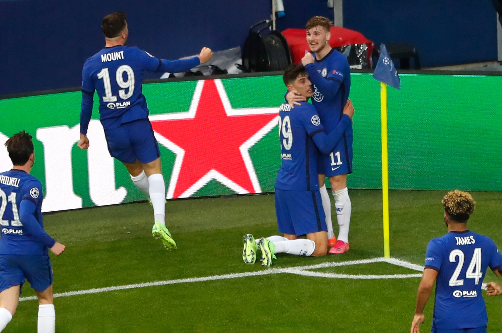 Chelsea's Kai Havertz celebrates with team mates scoring the opening goal during the Champions League final soccer match between Manchester City and Chelsea at the Dragao Stadium in Porto, Portugal, Saturday, May 29, 2021. (Susana Vera/Pool via AP)