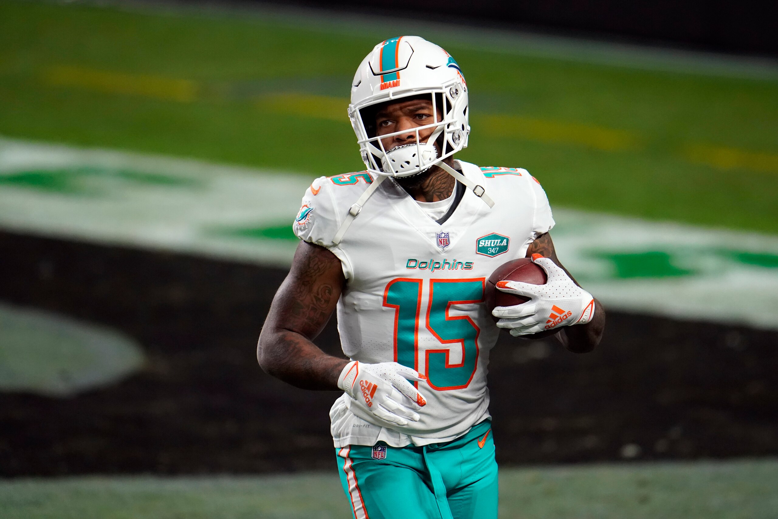Miami Dolphins wide receiver Lynn Bowden Jr. #15 warms up prior to playing the Las Vegas Raiders in an NFL football game, Saturday, Dec. 26, 2020, in Las Vegas. (AP Photo/Jeff Bottari)