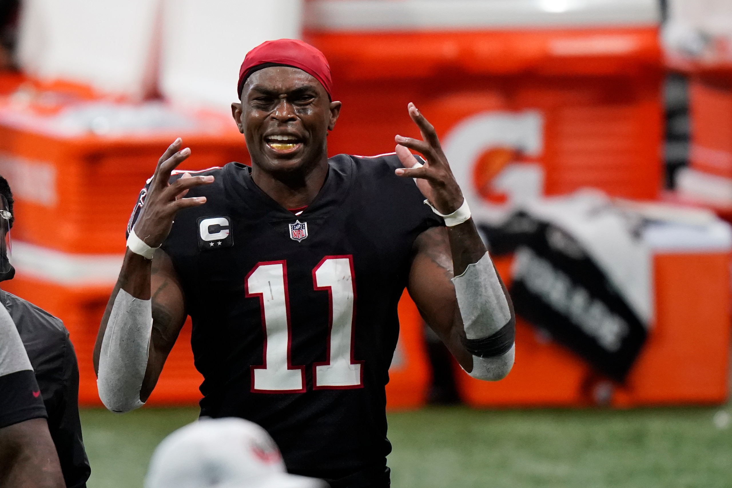 Atlanta Falcons wide receiver Julio Jones (11) leaves the field against the New Orleans Saints during the first half of an NFL football game, Sunday, Dec. 6, 2020, in Atlanta. (AP Photo/Brynn Anderson)