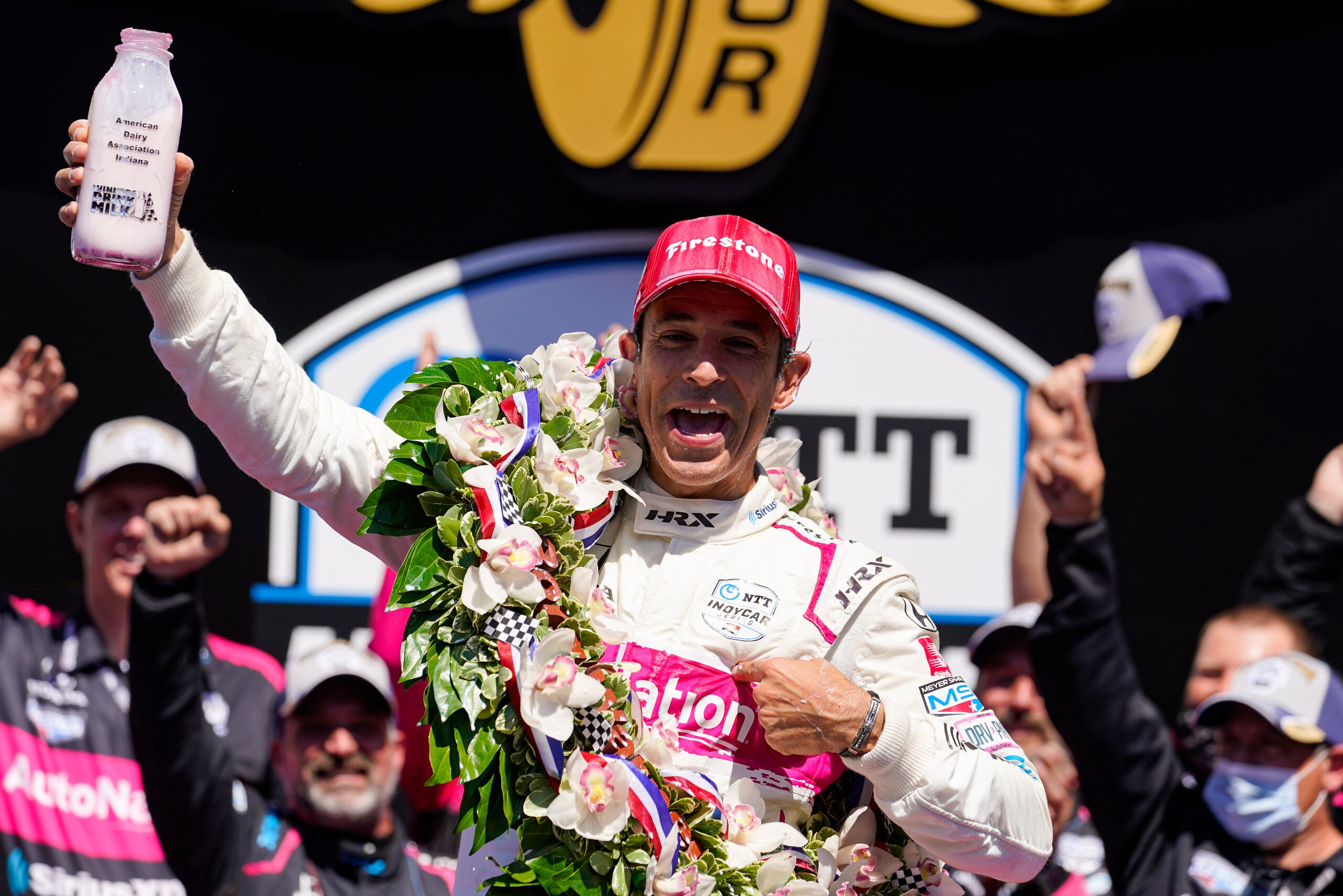 Helio Castroneves of Brazil celebrates after winning the Indianapolis 500 auto race at Indianapolis Motor Speedway in Indianapolis, Sunday, May 30, 2021. (AP Photo/Michael Conroy) Helio Castroneves of Brazil celebrates after winning the Indianapolis 500 auto race at Indianapolis Motor Speedway in Indianapolis, Sunday, May 30, 2021. (AP Photo/Michael Conroy)