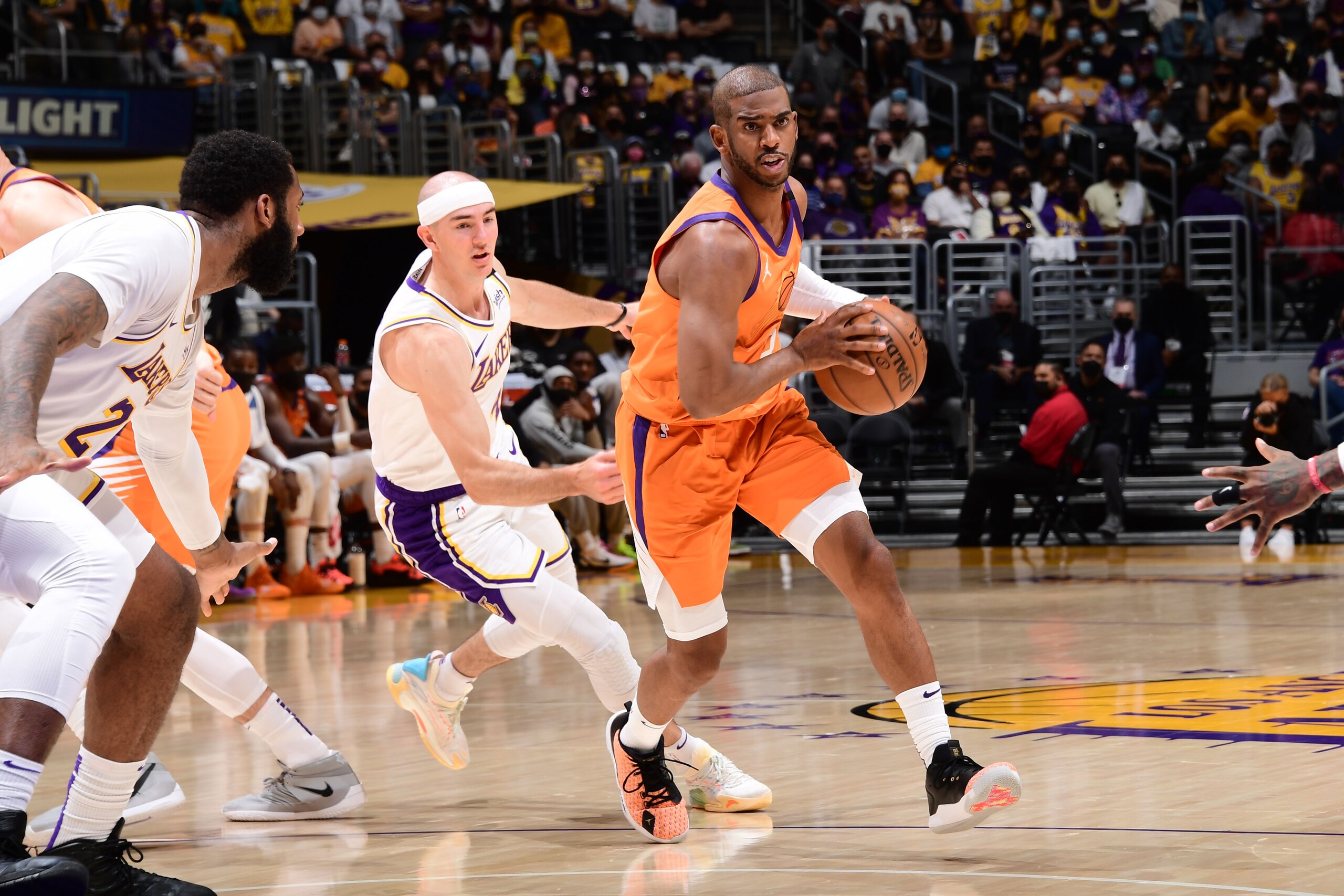 LOS ANGELES, CA - MAY 30: Chris Paul #3 of the Phoenix Suns dribbles the ball during the game against the Los Angeles Lakers during Round 1, Game 4 of the 2021 NBA Playoffs on May 30, 2021 at STAPLES Center in Los Angeles, California. NOTE TO USER: User expressly acknowledges and agrees that, by downloading and/or using this Photograph, user is consenting to the terms and conditions of the Getty Images License Agreement. Mandatory Copyright Notice: Copyright 2021 NBAE (Photo by Adam Pantozzi/NBAE via Getty Images) LOS ANGELES, CA - MAY 30: Chris Paul #3 of the Phoenix Suns dribbles the ball during the game against the Los Angeles Lakers during Round 1, Game 4 of the 2021 NBA Playoffs on May 30, 2021 at STAPLES Center in Los Angeles, California. NOTE TO USER: User expressly acknowledges and agrees that, by downloading and/or using this Photograph, user is consenting to the terms and conditions of the Getty Images License Agreement. Mandatory Copyright Notice: Copyright 2021 NBAE (Photo by Adam Pantozzi/NBAE via Getty Images)