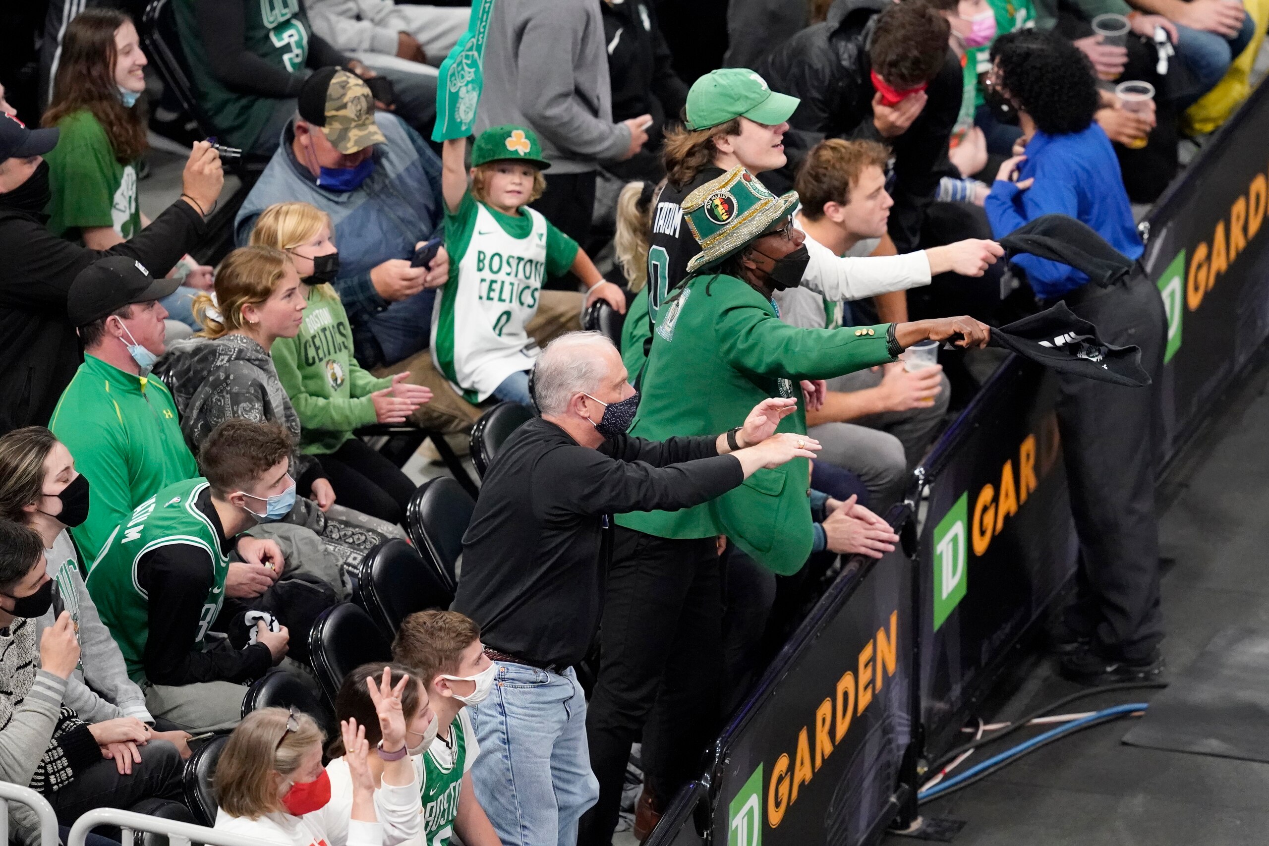 Fans make noise to distract Brooklyn Nets guard Kyrie Irving (11) as he shoots a free throw in the first quarter of Game 4 against the Boston Celtics during an NBA basketball first-round playoff series, Sunday, May 30, 2021, in Boston. (AP Photo/Elise Amendola) Fans make noise to distract Brooklyn Nets guard Kyrie Irving (11) as he shoots a free throw in the first quarter of Game 4 against the Boston Celtics during an NBA basketball first-round playoff series, Sunday, May 30, 2021, in Boston. (AP Photo/Elise Amendola)