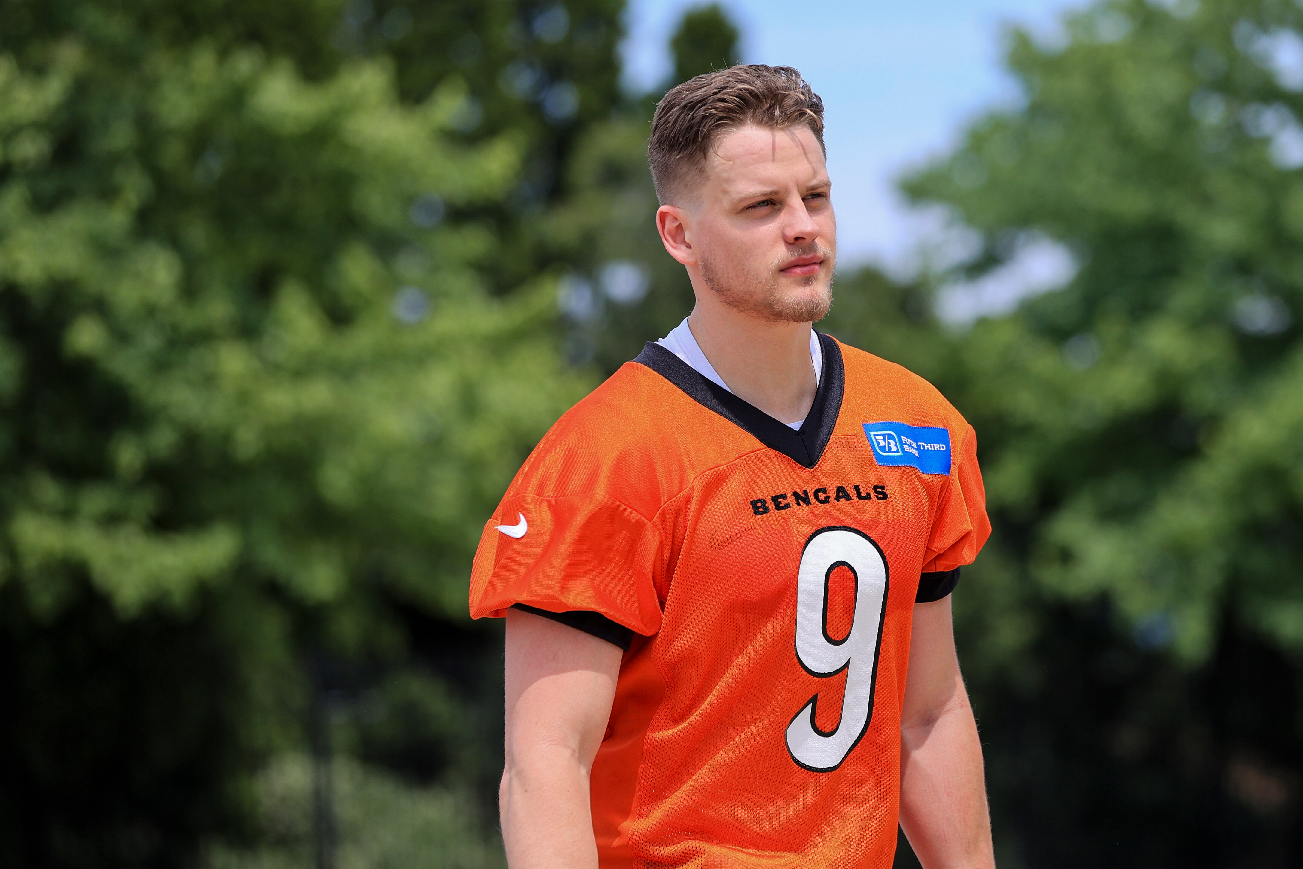 Cincinnati Bengals Joe Burrow walks to the stadium after an NFL football camp practice in Cincinnati, Tuesday, May 25, 2021. (AP Photo/Aaron Doster)