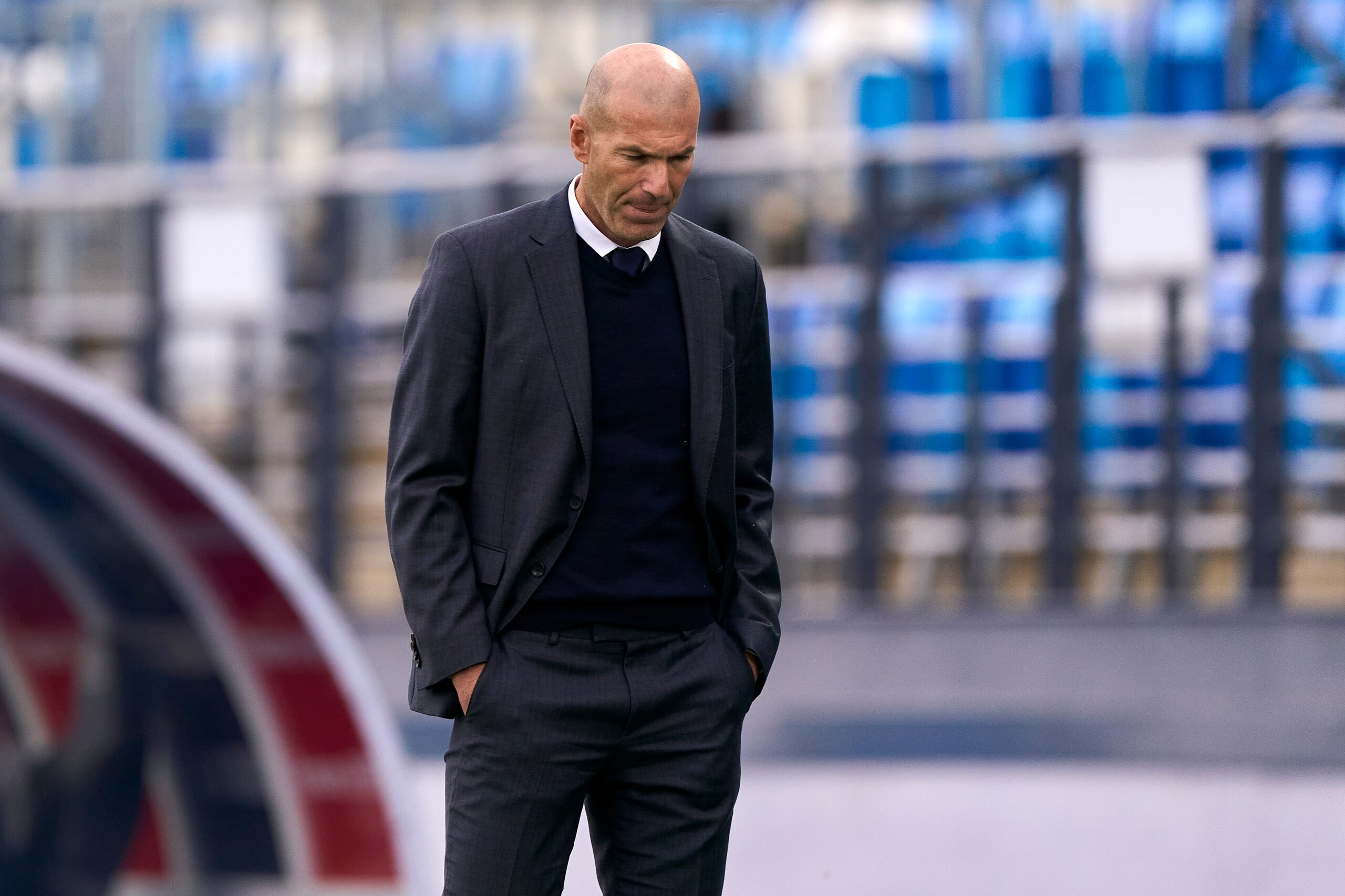 MADRID, SPAIN - MAY 22: Zinedine Zidane head Coach of Real Madrid reacts during the La Liga Santander match between Real Madrid and Villarreal CF at Estadio Alfredo Di Stefano on May 22, 2021 in Madrid, Spain. Sporting stadiums around Spain remain under strict restrictions due to the Coronavirus Pandemic as Government social distancing laws prohibit fans inside venues resulting in games being played behind closed doors (Photo by Diego Souto/Quality Sport Images/Getty Images)