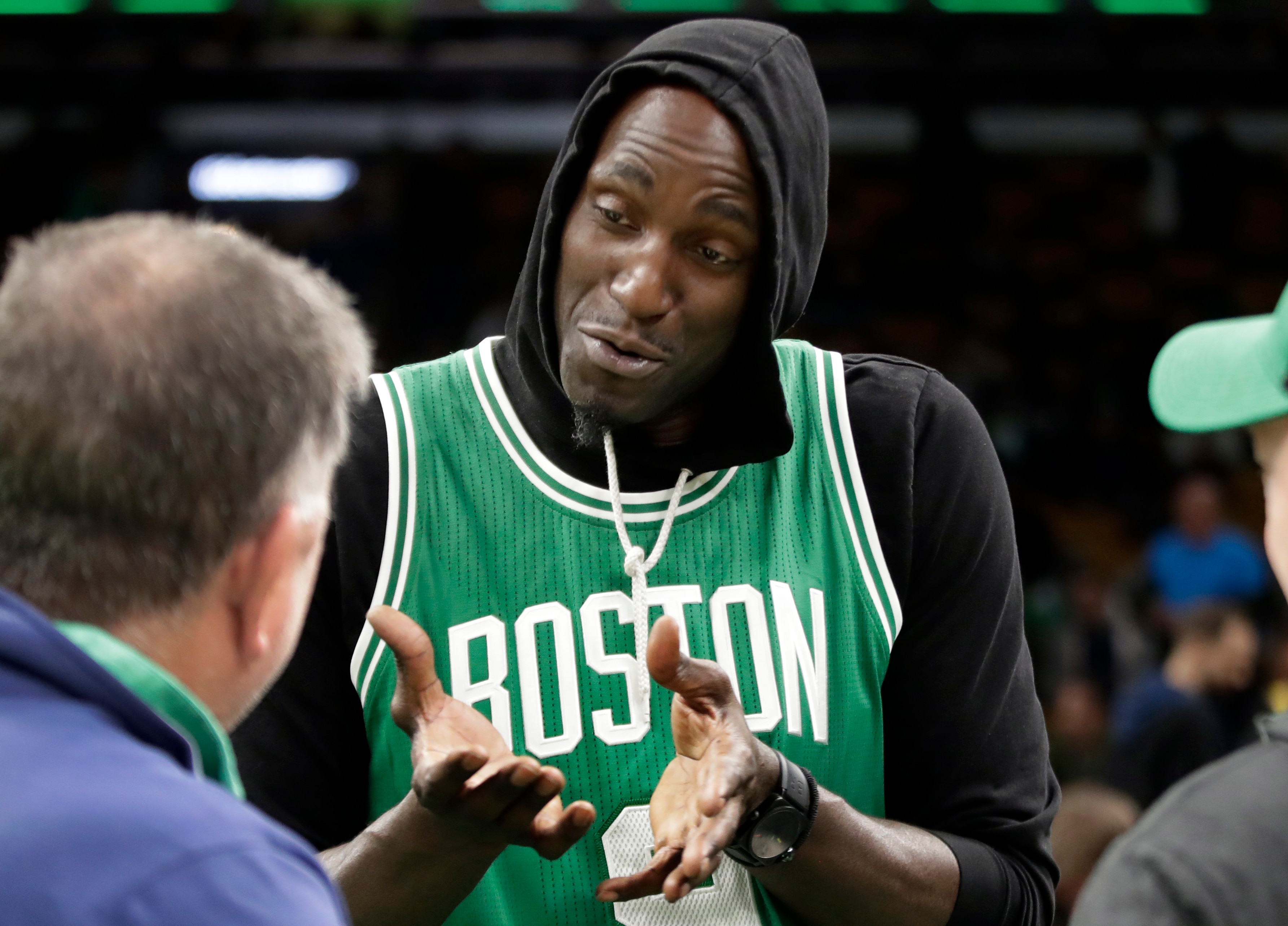 Former Boston Celtics' Kevin Garnett chats before an NBA basketball game between the Boston Celtics and the Los Angeles Lakers, Thursday, Feb. 7, 2019, in Boston. (AP Photo/Elise Amendola)