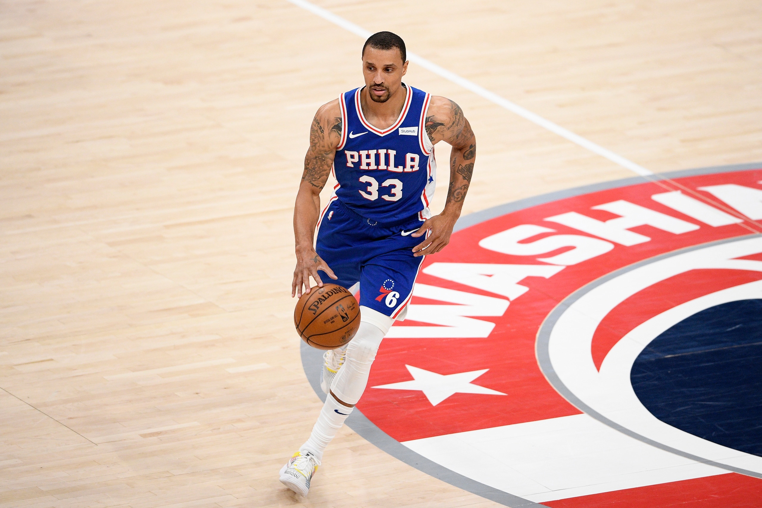 Philadelphia 76ers guard George Hill (33) dribbles the ball during the second half of Game 3 in a first-round NBA basketball playoff series against the Washington Wizards, Saturday, May 29, 2021, in Washington. (AP Photo/Nick Wass) Philadelphia 76ers guard George Hill (33) dribbles the ball during the second half of Game 3 in a first-round NBA basketball playoff series against the Washington Wizards, Saturday, May 29, 2021, in Washington. (AP Photo/Nick Wass)