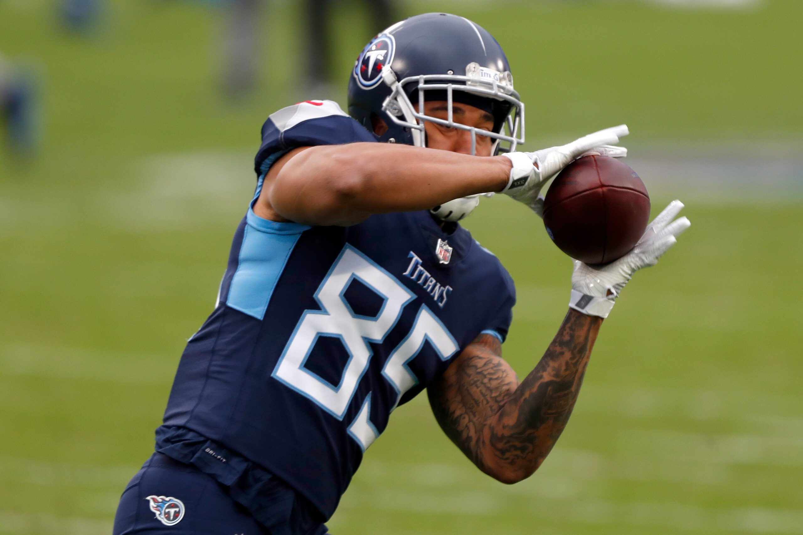 NASHVILLE, TENNESSEE - DECEMBER 20: Tight end MyCole Pruitt #85 of the Tennessee Titans  warms up prior to the game against Detroit Lions at Nissan Stadium on December 20, 2020 in Nashville, Tennessee. (Photo by Wesley Hitt/Getty Images)