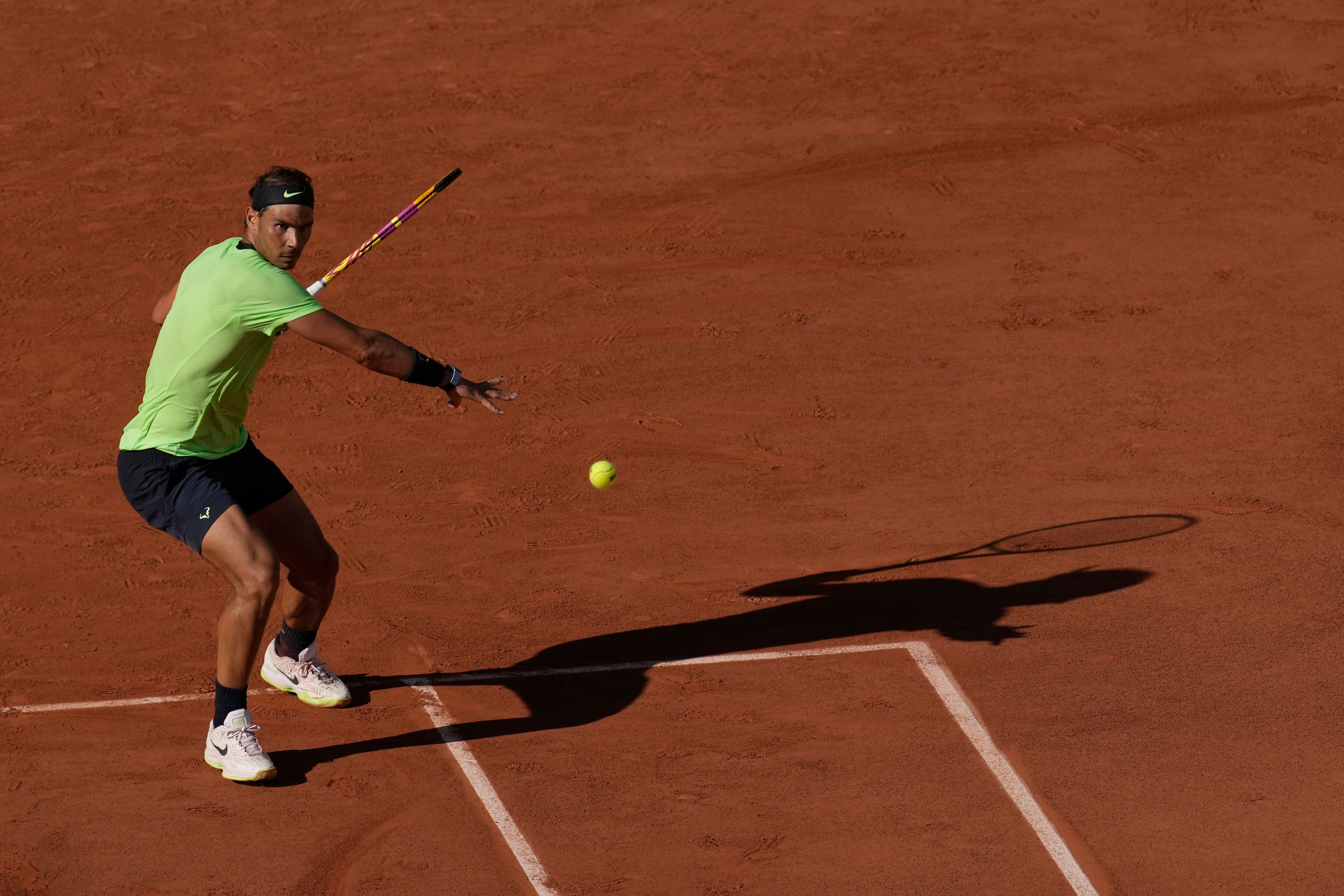 Spain's Rafael Nadal plays a return to Australia's Alexei Popyrin during their first round match on day three of the French Open tennis tournament at Roland Garros in Paris, France, Tuesday, June 1, 2021. (AP Photo/Christophe Ena)