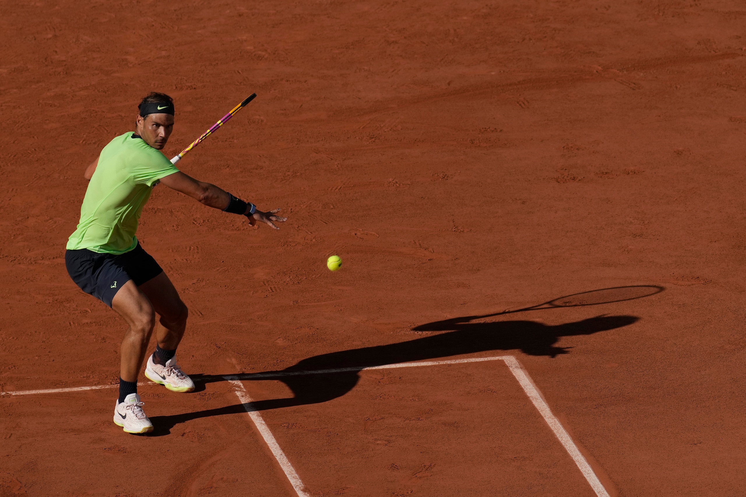 Spain's Rafael Nadal plays a return to Australia's Alexei Popyrin during their first round match on day three of the French Open tennis tournament at Roland Garros in Paris, France, Tuesday, June 1, 2021. (AP Photo/Christophe Ena)