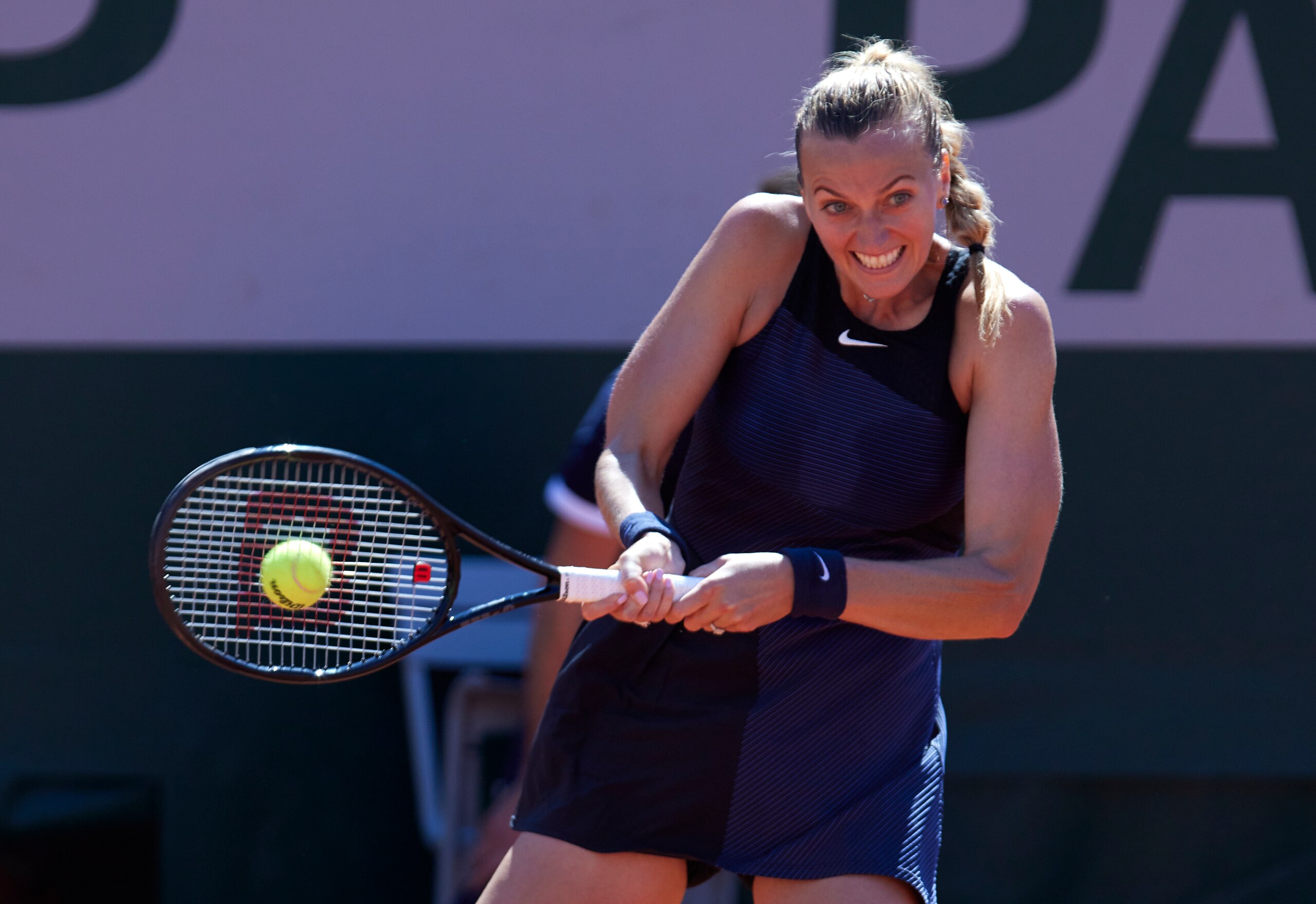 PARIS, FRANCE - MAY 30: Petra Kvitova of The Czech Republic plays a backhand shot in her First Round match against Greet Minnen of Belgium during Day One of the 2021 French Open at Roland Garros on May 30 at Roland Garros on May 30, 2021 in Paris, France. (Photo by Tnani Badreddine/Quality Sport Images/Getty Images)