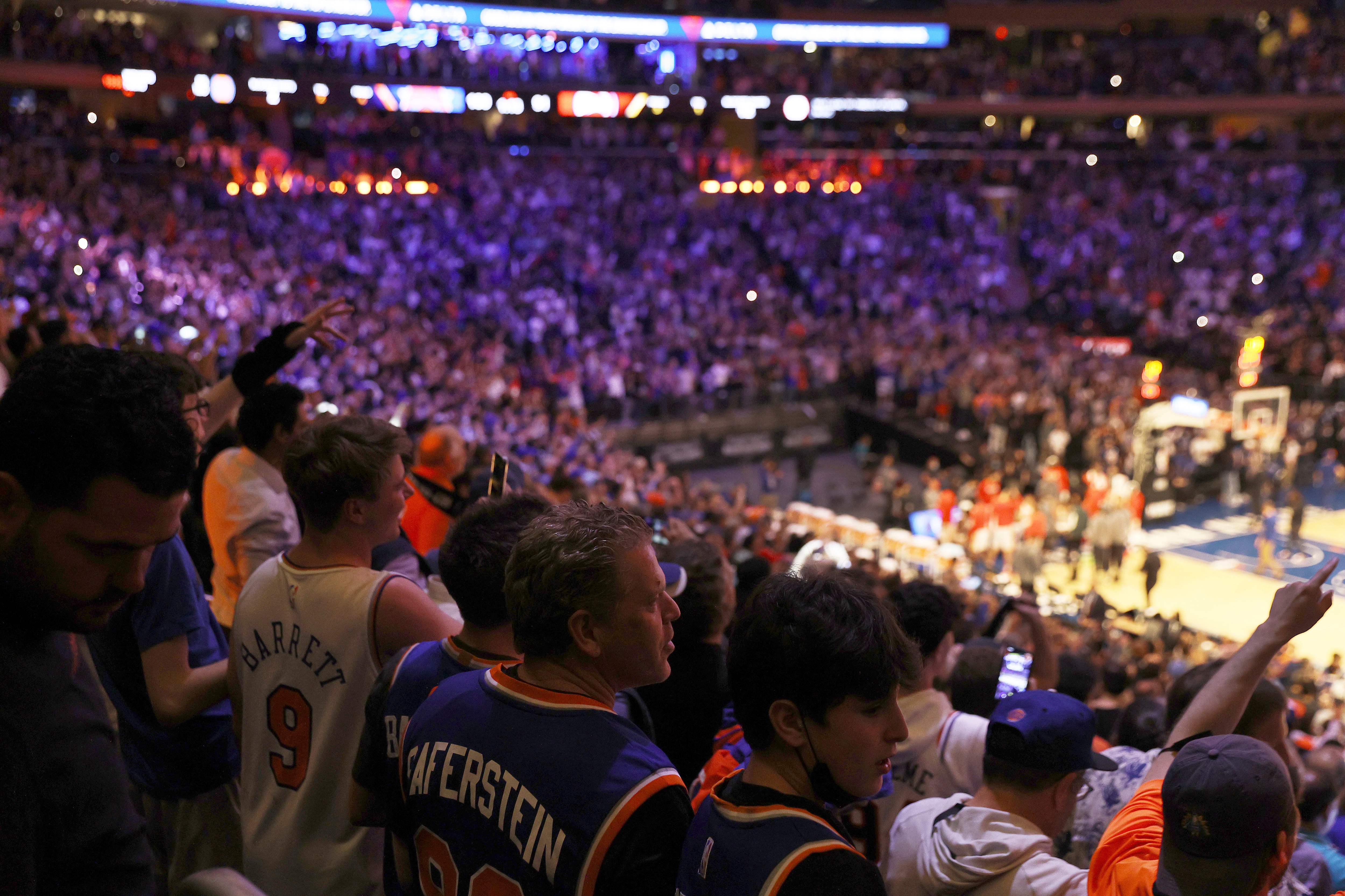 Nearly 15,000 fans attend Game 2 in an NBA basketball first-round playoff series between the Atlanta Hawks and the New York Knicks on Wednesday, May 26, 2021, at Madison Square Garden in New York. (Elsa/Pool Photo via AP)