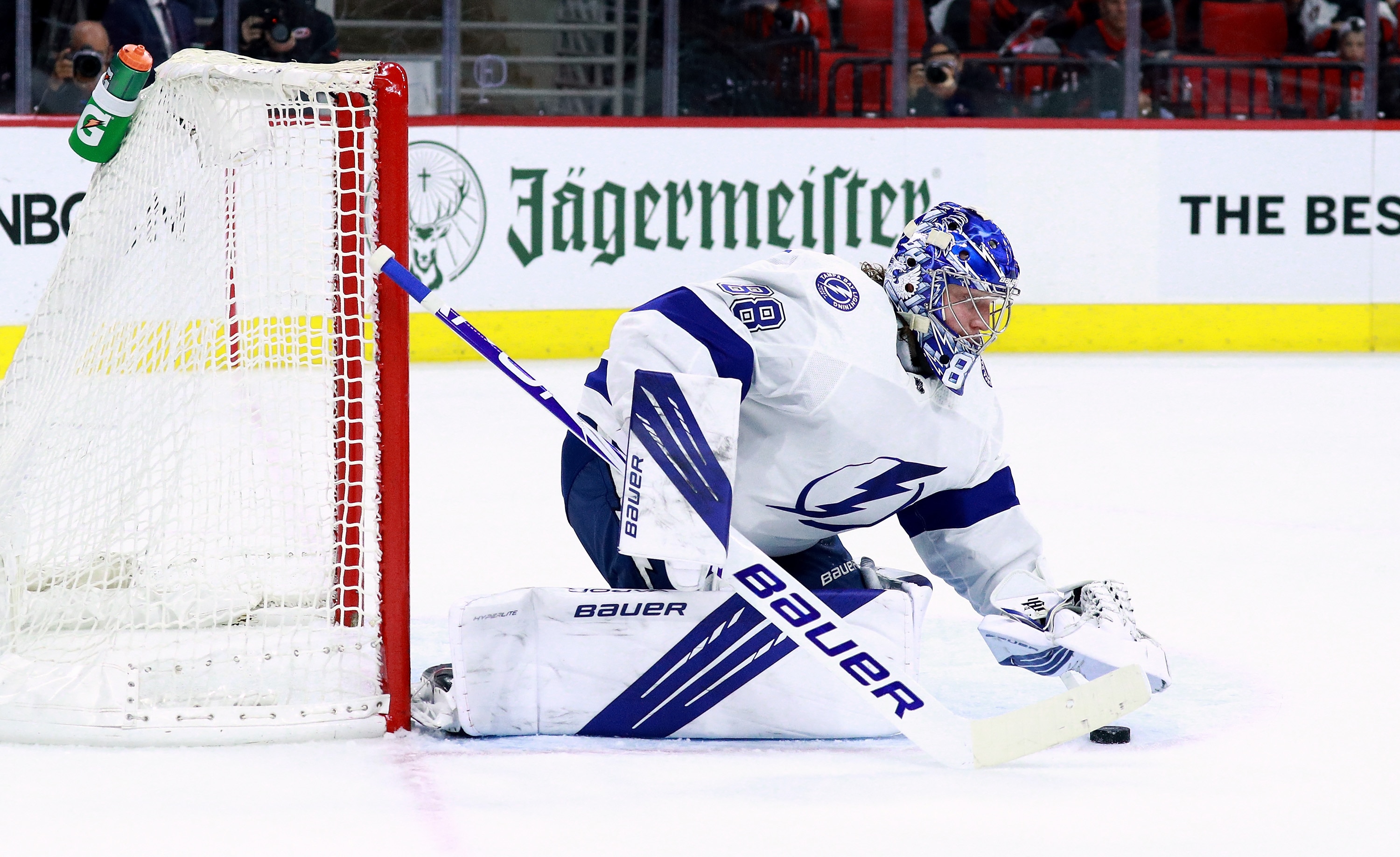 RALEIGH, NORTH CAROLINA - MAY 30: Andrei Vasilevskiy #88 of the Tampa Bay Lightning stops a shot by the Carolina Hurricanes during the first period in Game One of the Second Round of the 2021 Stanley Cup Playoffs at PNC Arena on May 30, 2021 in Raleigh, North Carolina. (Photo by Grant Halverson/Getty Images)