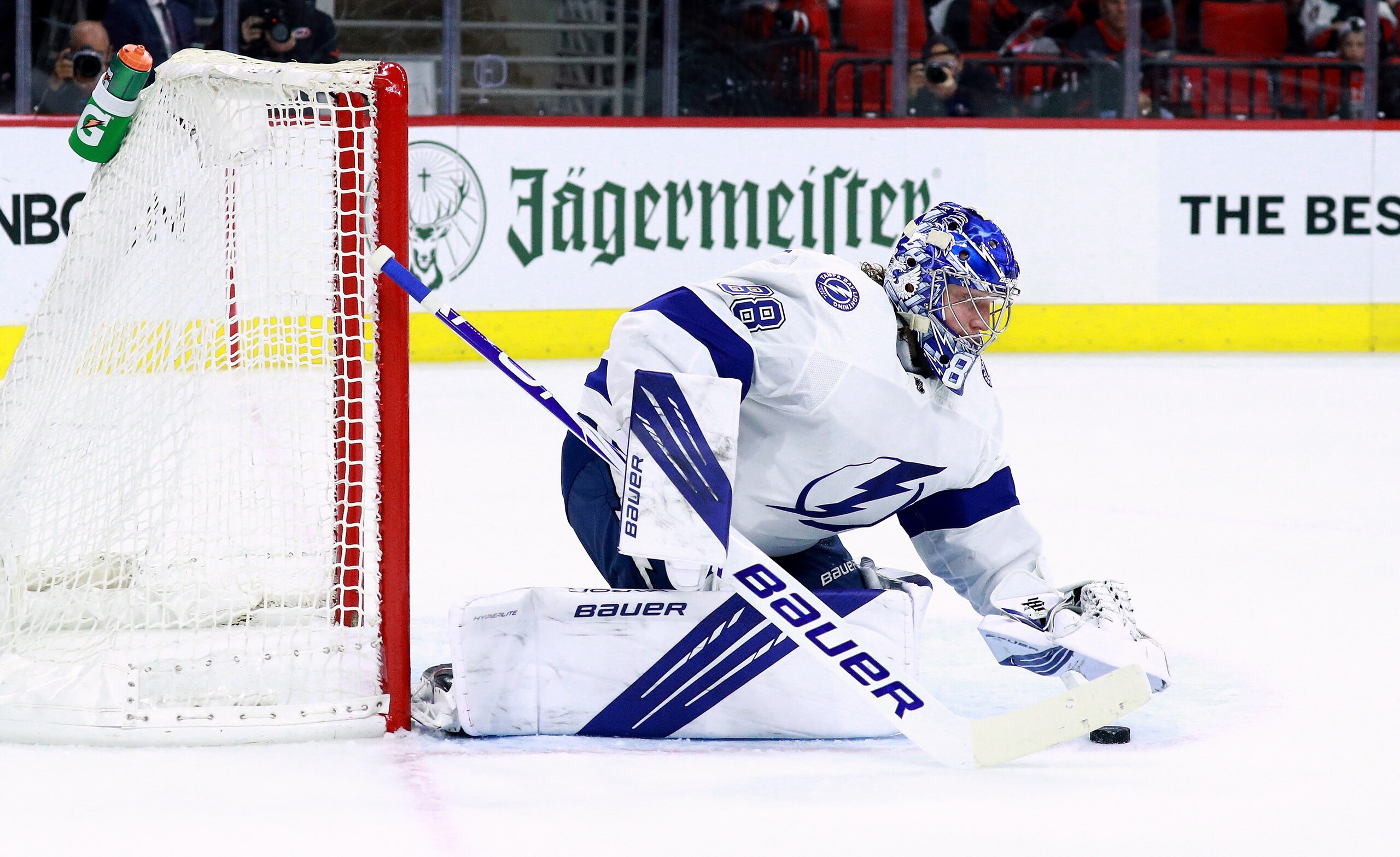 RALEIGH, NORTH CAROLINA - MAY 30: Andrei Vasilevskiy #88 of the Tampa Bay Lightning stops a shot by the Carolina Hurricanes during the first period in Game One of the Second Round of the 2021 Stanley Cup Playoffs at PNC Arena on May 30, 2021 in Raleigh, North Carolina. (Photo by Grant Halverson/Getty Images)