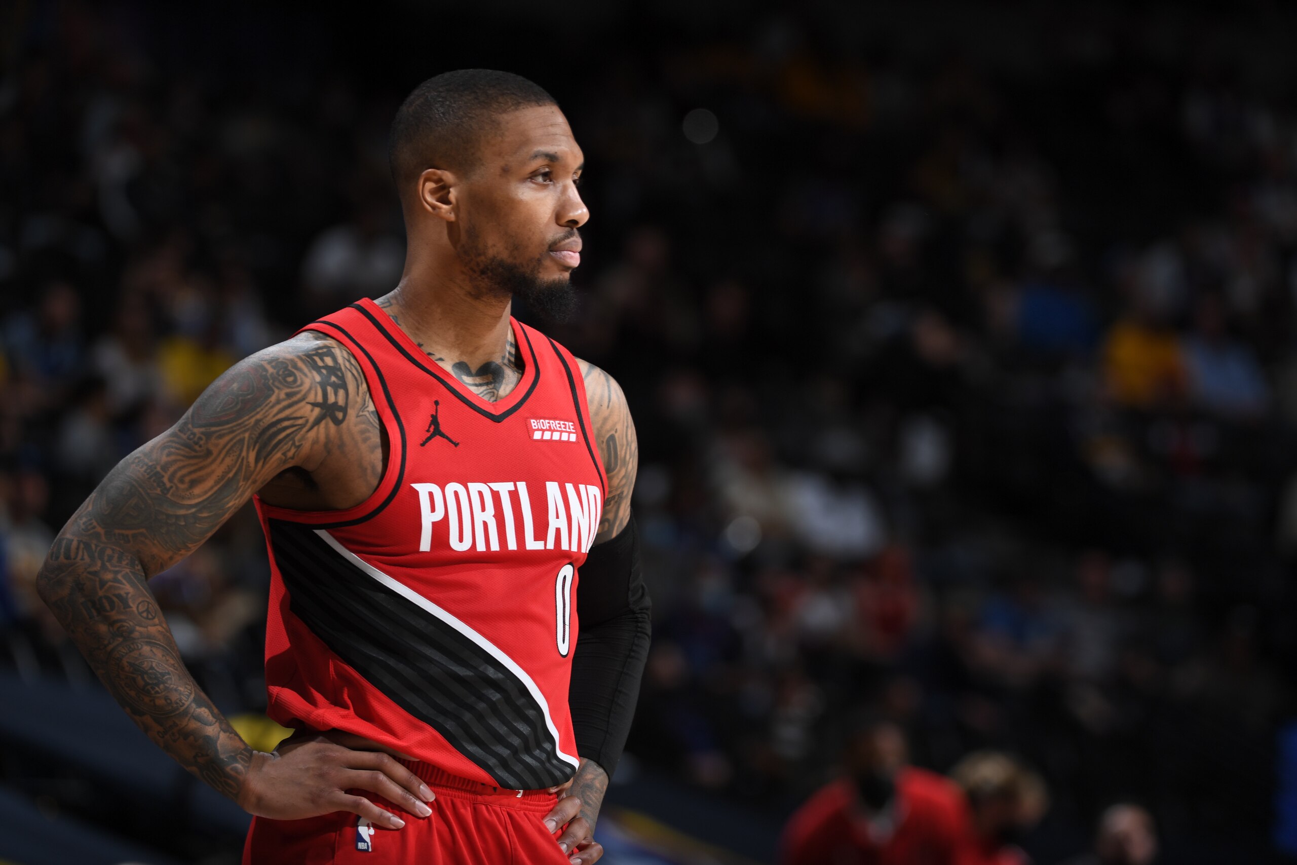 DENVER, CO - JUNE 1: Damian Lillard #0 of the Portland Trail Blazers looks on during Round 1, Game 5 of the 2021 NBA Playoffs on June 1, 2021 at the Ball Arena in Denver, Colorado. NOTE TO USER: User expressly acknowledges and agrees that, by downloading and/or using this Photograph, user is consenting to the terms and conditions of the Getty Images License Agreement. Mandatory Copyright Notice: Copyright 2021 NBAE (Photo by Garrett Ellwood/NBAE via Getty Images)