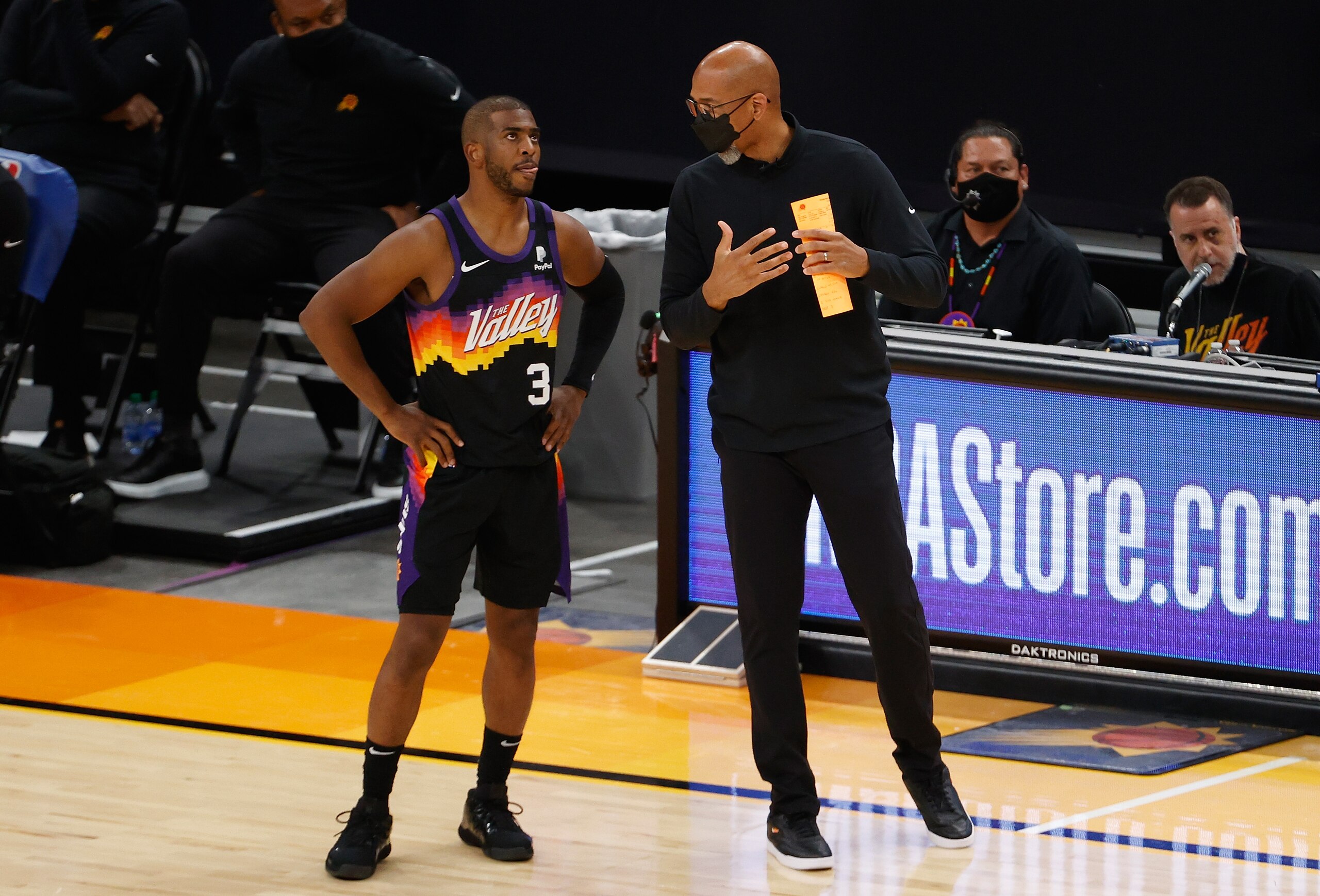PHOENIX, ARIZONA - APRIL 07: Head coach Monty Williams of the Phoenix Suns talks with Chris Paul #3 of the Phoenix Suns during the first half of the NBA game against the Utah Jazz at Phoenix Suns Arena on April 07, 2021 in Phoenix, Arizona. NOTE TO USER: User expressly acknowledges and agrees that, by downloading and or using this photograph, User is consenting to the terms and conditions of the Getty Images License Agreement. (Photo by Christian Petersen/Getty Images)