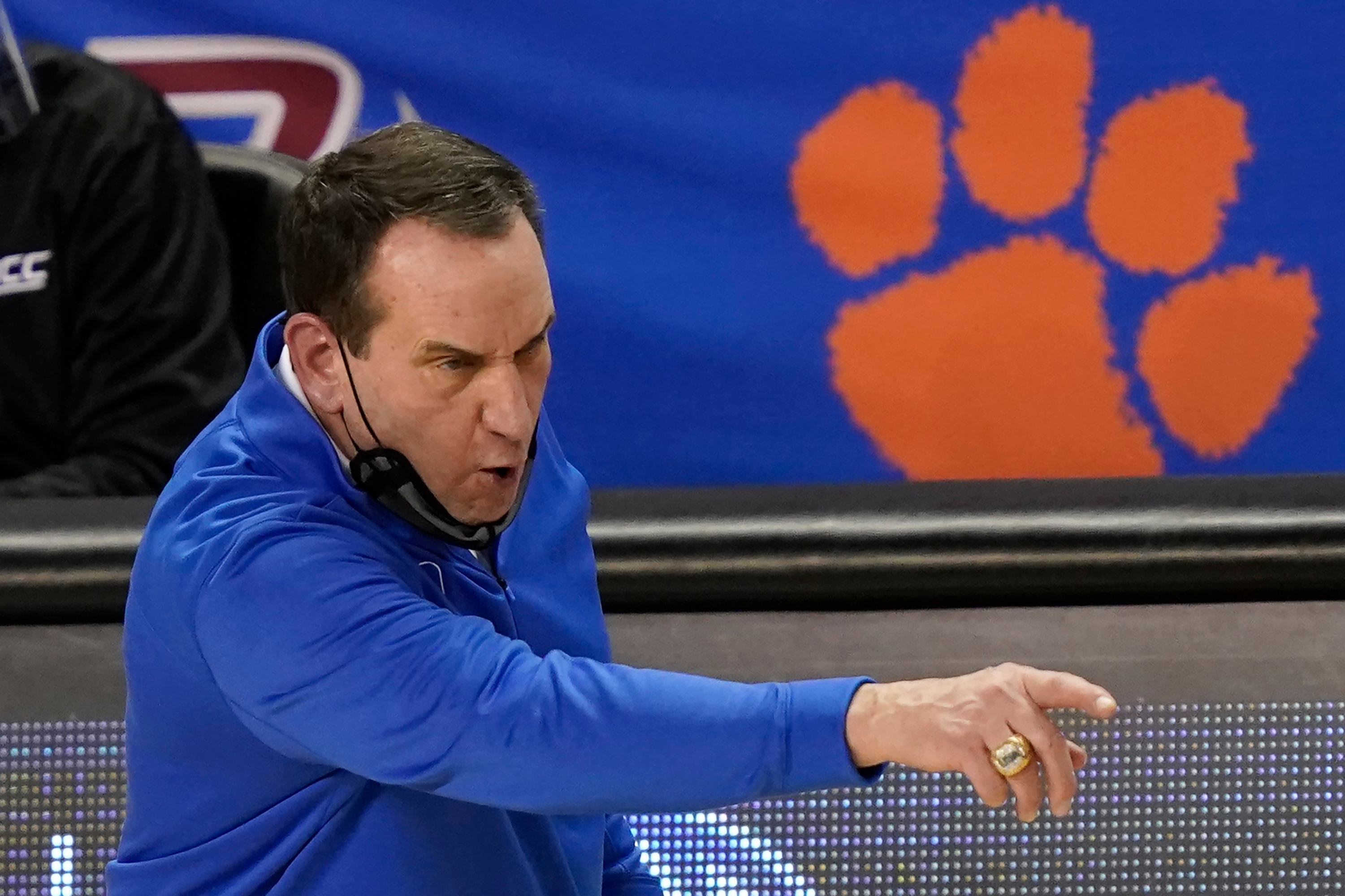 Duke head coach Mike Krzyzewski directs his team during the second half of an NCAA college basketball game against Boston College in the first round of the Atlantic Coast Conference tournament in Greensboro, N.C., Tuesday, March 9, 2021. (AP Photo/Gerry Broome)