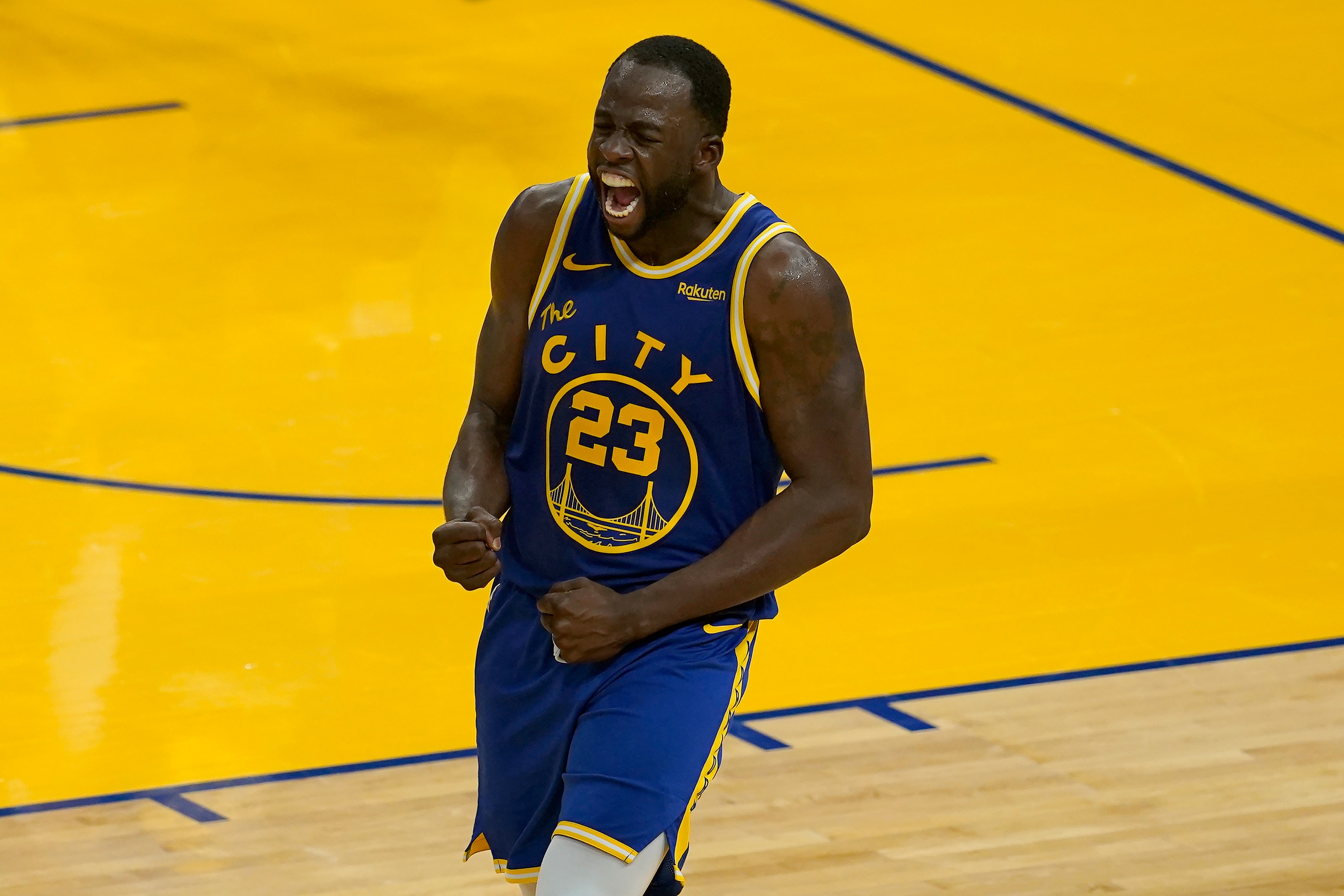 Golden State Warriors forward Draymond Green (23) celebrates during an NBA basketball game against the Phoenix Suns in San Francisco, Tuesday, May 11, 2021. (AP Photo/Jeff Chiu)