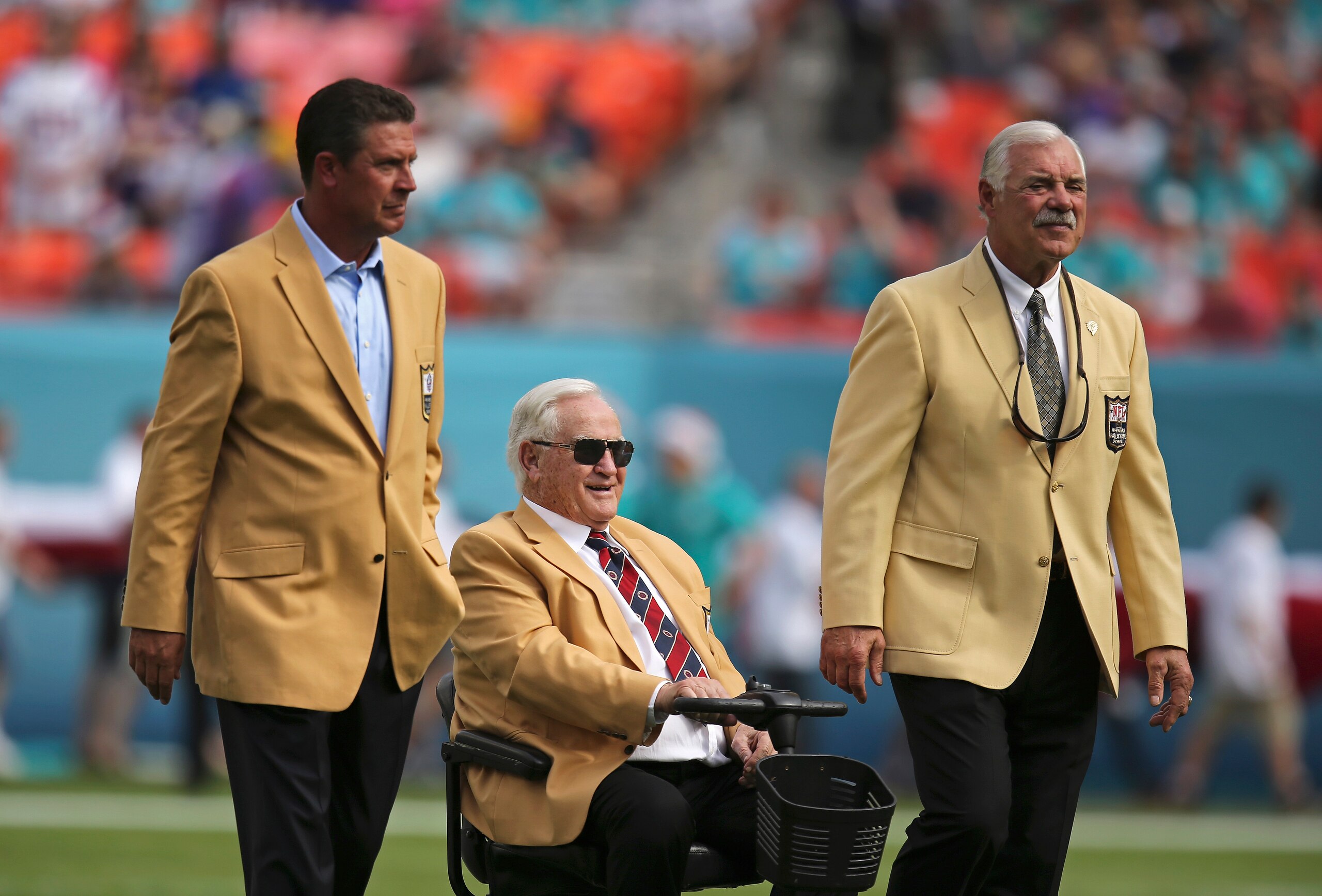 MIAMI GARDENS, FL - DECEMBER 21:  Miami Dolphins greats (L to R) Dan Marino Don Shula and Larry Csonka are shown on the field before the Dolphins met the Minnesota Vikings in a game at Sun Life Stadium on December 21, 2014 in Miami Gardens, Florida.  (Photo by Rob Foldy/Getty Images)