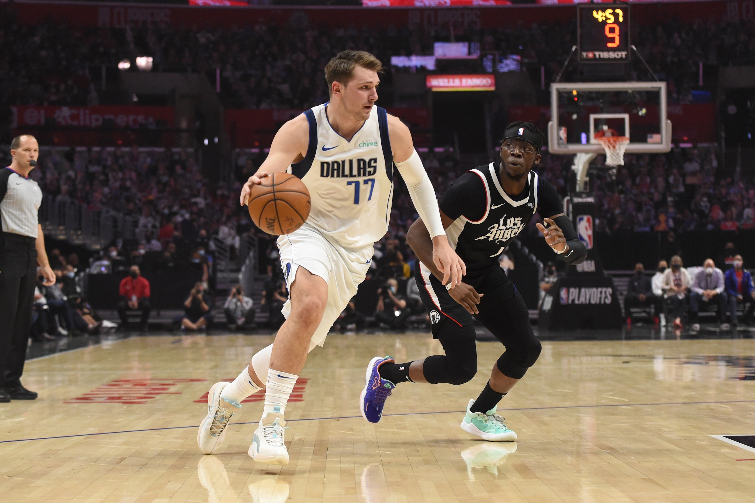 LOS ANGELES, CA - JUNE 2: Luka Doncic #77 of the Dallas Mavericks drives to the basket against the LA Clippers during Round 1, Game 5 of the 2021 NBA Playoffs on June 2, 2021 at STAPLES Center in Los Angeles, California. NOTE TO USER: User expressly acknowledges and agrees that, by downloading and/or using this Photograph, user is consenting to the terms and conditions of the Getty Images License Agreement. Mandatory Copyright Notice: Copyright 2021 NBAE (Photo by Juan Ocampo/NBAE via Getty Images)