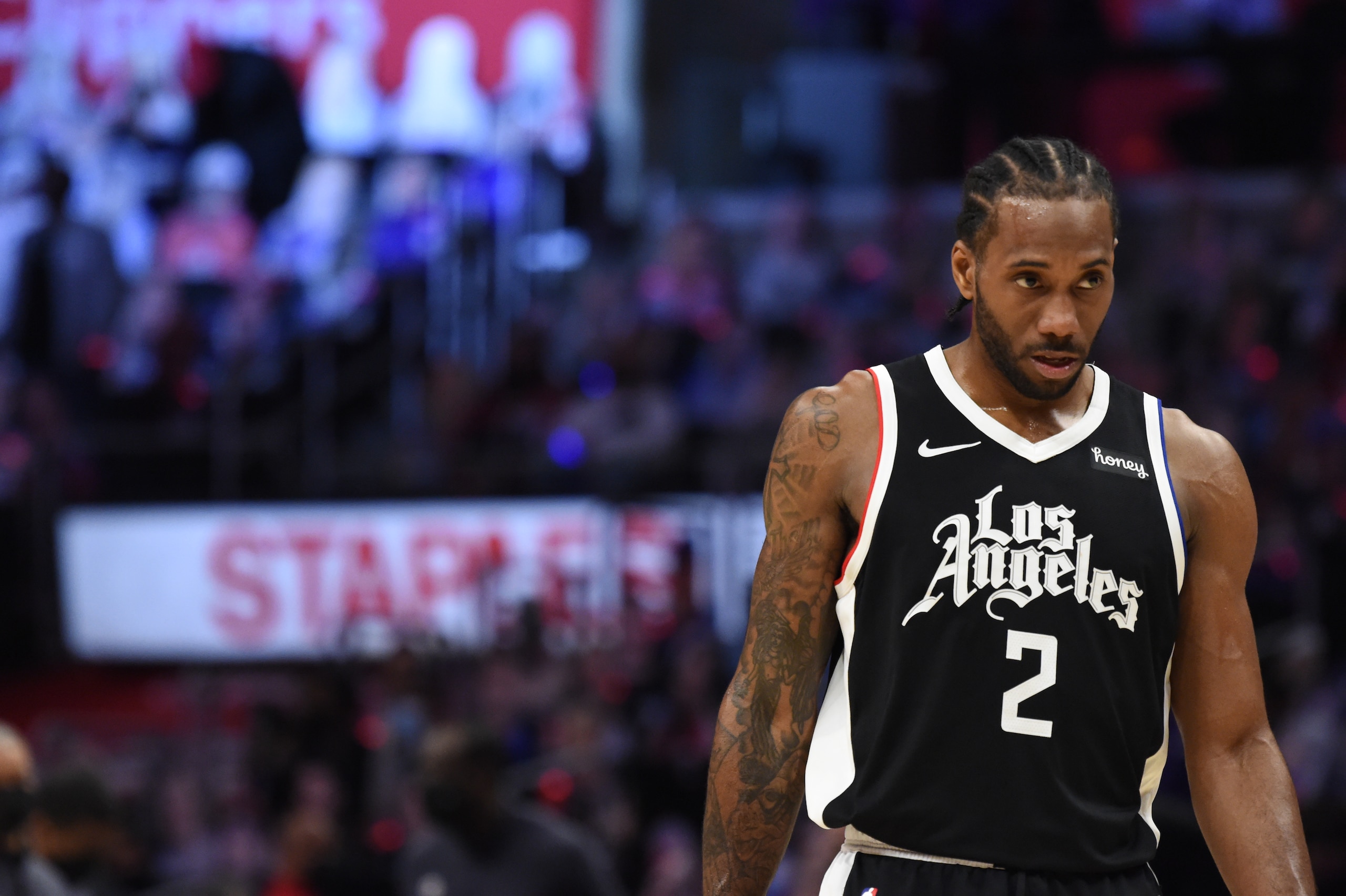 LOS ANGELES, CA - JUNE 2: Kawhi Leonard #2 of the LA Clippers looks on during Round 1, Game 5 of the 2021 NBA Playoffs on June 2, 2021 at STAPLES Center in Los Angeles, California. NOTE TO USER: User expressly acknowledges and agrees that, by downloading and/or using this Photograph, user is consenting to the terms and conditions of the Getty Images License Agreement. Mandatory Copyright Notice: Copyright 2021 NBAE (Photo by Juan Ocampo/NBAE via Getty Images)