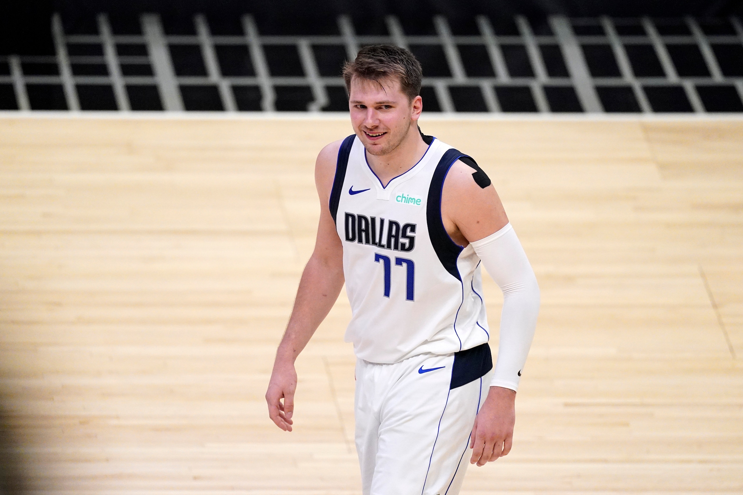 Dallas Mavericks guard Luka Doncic smiles after they scored during the second half in Game 5 of an NBA basketball first-round playoff series against the Los Angeles Clippers Wednesday, June 2, 2021, in Los Angeles. (AP Photo/Mark J. Terrill)