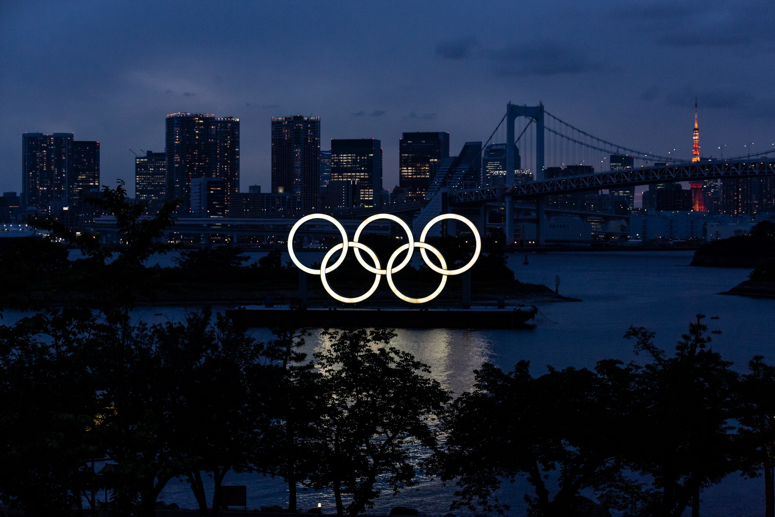 TOKYO, JAPAN - JUNE 03: The Olympic Rings are displayed by the Odaiba Marine Park Olympic venue on June 03, 2021 in Tokyo, Japan. Tokyo 2020 president Seiko Hashimoto has stated that she is 100 percent certain that the Olympics will go ahead despite widespread public opposition as Japan grapples with a fourth wave of coronavirus. The Japanese organising committee also announced yesterday that around 10,000 of the 80,000 volunteers originally scheduled to help at the Games have withdrawn as concern continues to surround the country’s ability to hold a huge sporting event amid a global pandemic. (Photo by Yuichi Yamazaki/Getty Images)