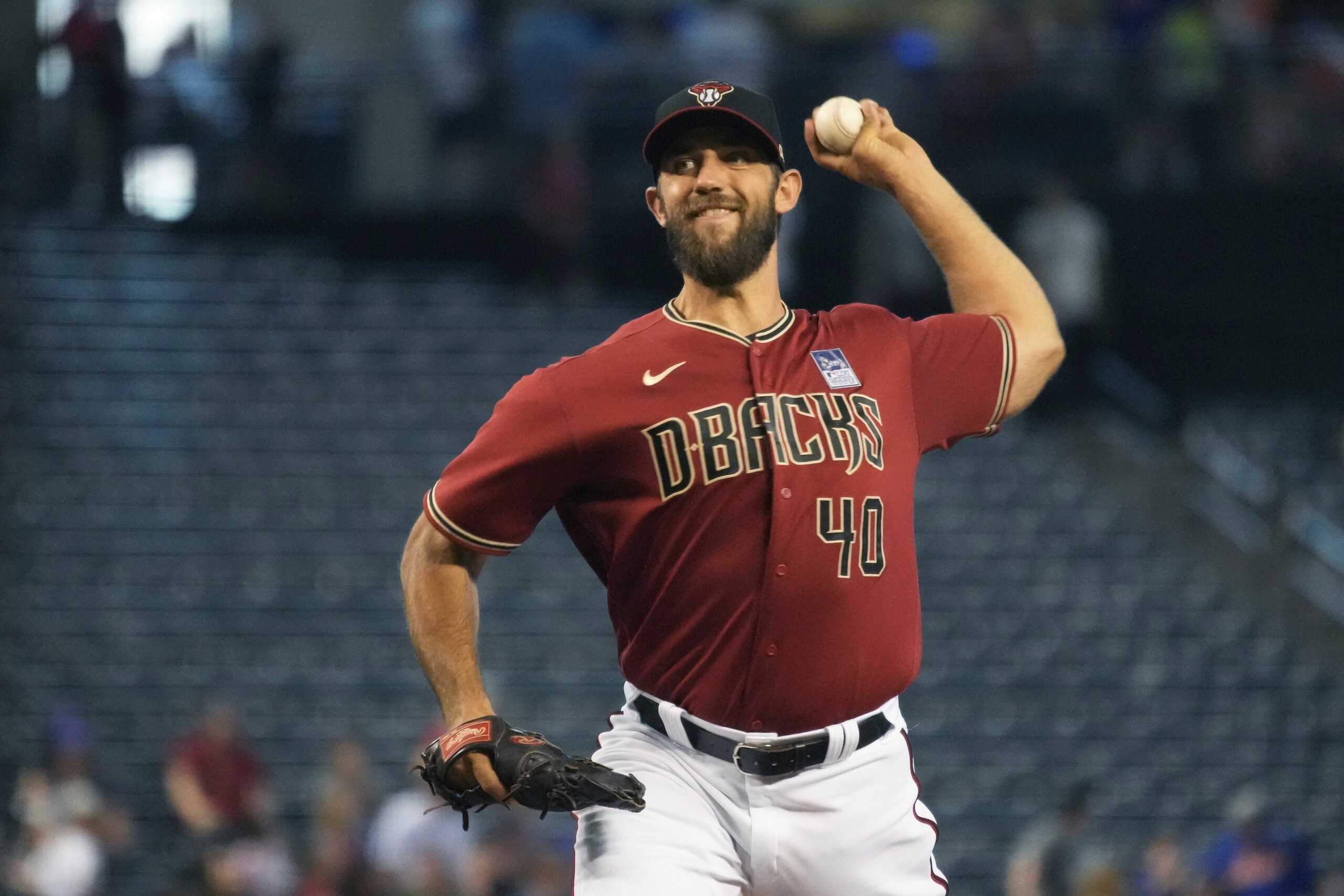 Arizona Diamondbacks pitcher Madison Bumgarner throws against the New York Mets in the first inning during a baseball game, Wednesday, June 2, 2021, in Phoenix. (AP Photo/Rick Scuteri)