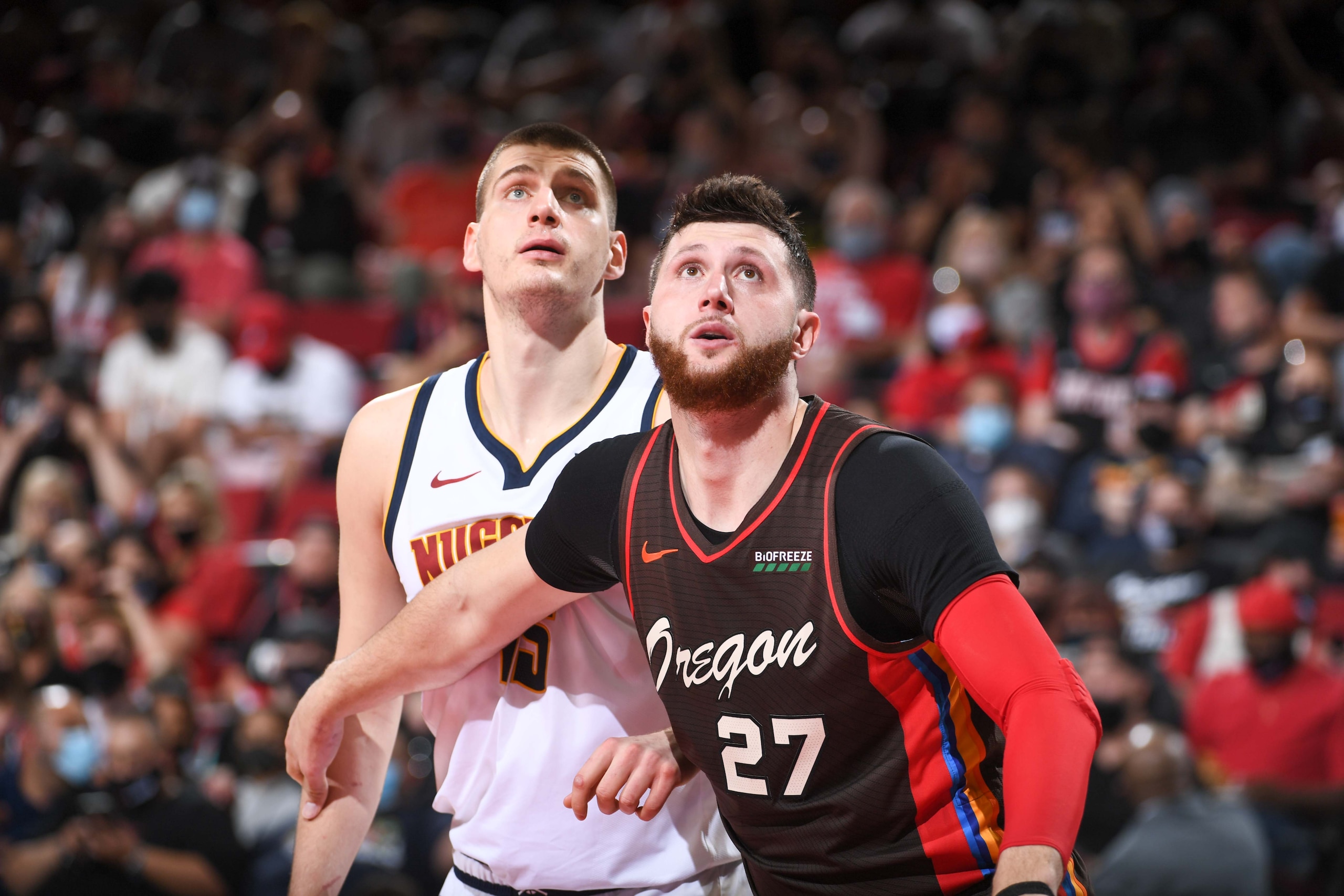 PORTLAND, OR - JUNE 3: Nikola Jokic #15 of the Denver Nuggets and Jusuf Nurkic #27 of the Portland Trail Blazers fight for position during the game during Round 1, Game 6 of the 2021 NBA Playoffs on June 3, 2021 at the Moda Center Arena in Portland, Oregon. NOTE TO USER: User expressly acknowledges and agrees that, by downloading and/or using this Photograph, user is consenting to the terms and conditions of the Getty Images License Agreement. Mandatory Copyright Notice: Copyright 2021 NBAE (Photo by Garrett Ellwood/NBAE via Getty Images)