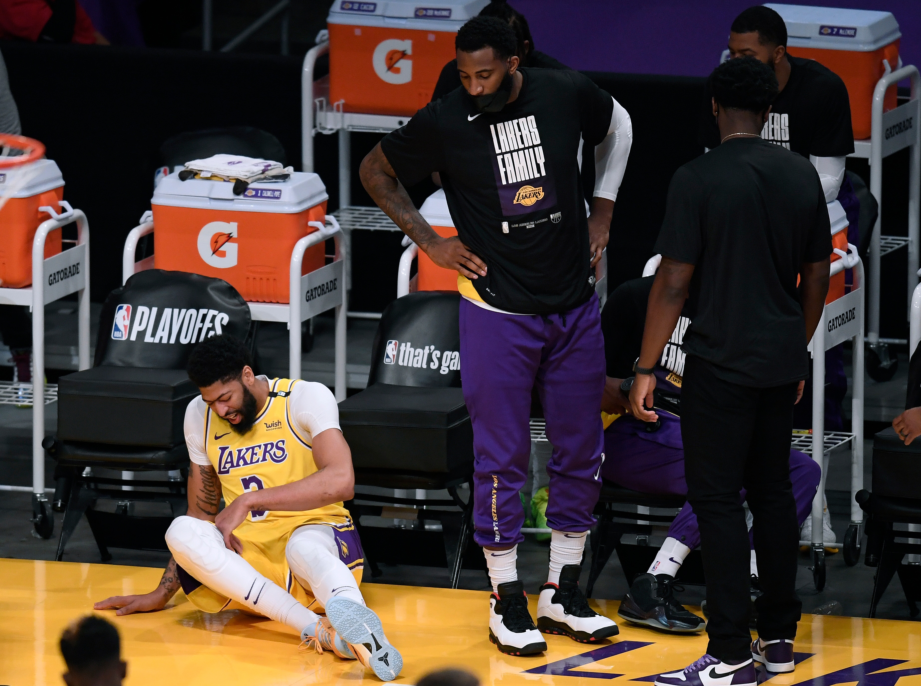 LOS ANGELES, CALIFORNIA - JUNE 03: Anthony Davis #3 of the Los Angeles Lakers falls at the Laker bench in the first quarter during game six of the Western Conference first round series at Staples Center on June 03, 2021 in Los Angeles, California. (Photo by Harry How/Getty Images) NOTE TO USER: User expressly acknowledges and agrees that, by downloading and or using this photograph, User is consenting to the terms and conditions of the Getty Images License Agreement.