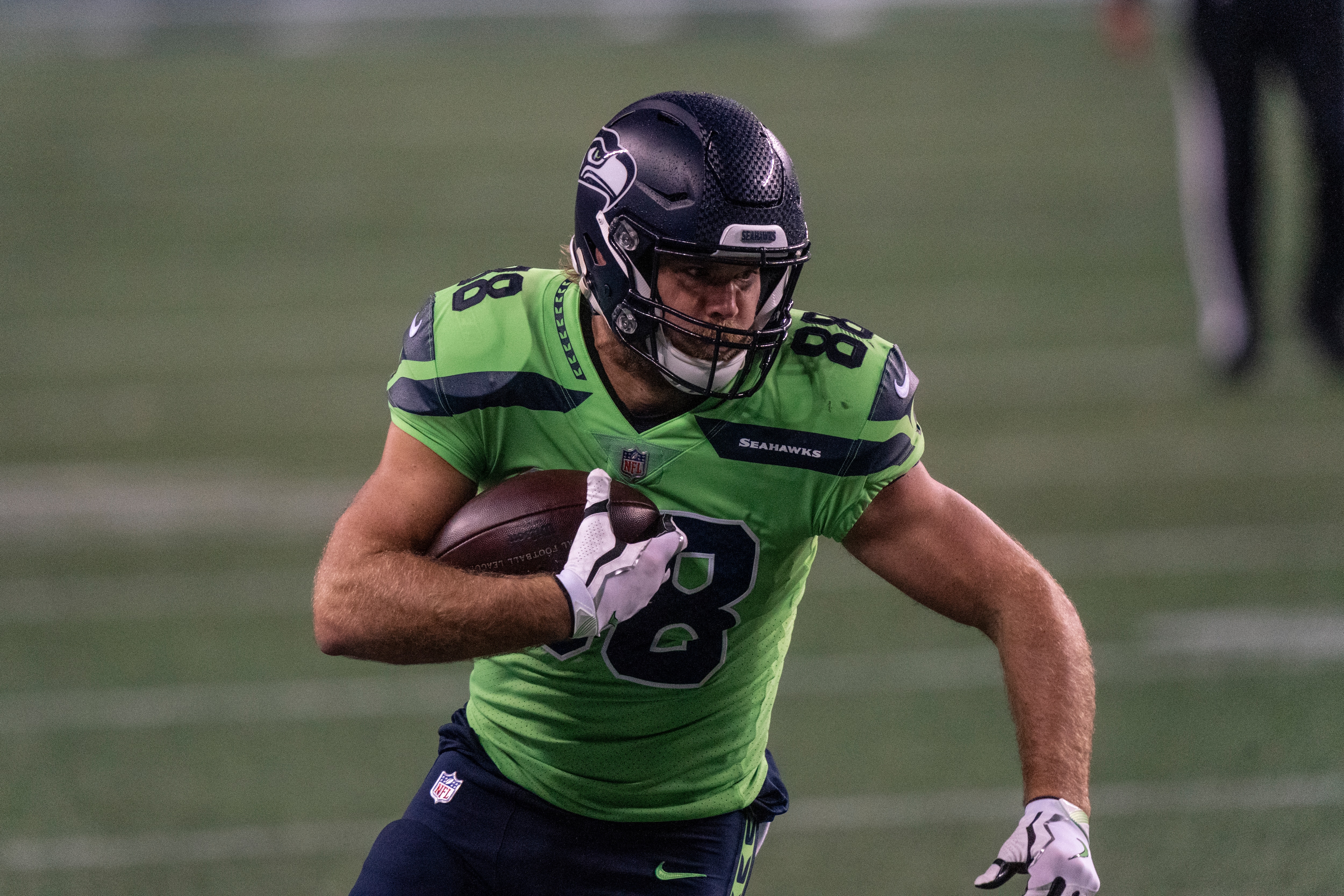 Seattle Seahawks tight end Greg Olsen runs with the during the second half of an NFL football game against the Minnesota Vikings, Sunday, Oct. 11, 2020, in Seattle. The Seahawks won 27-26. (AP Photo/Stephen Brashear)