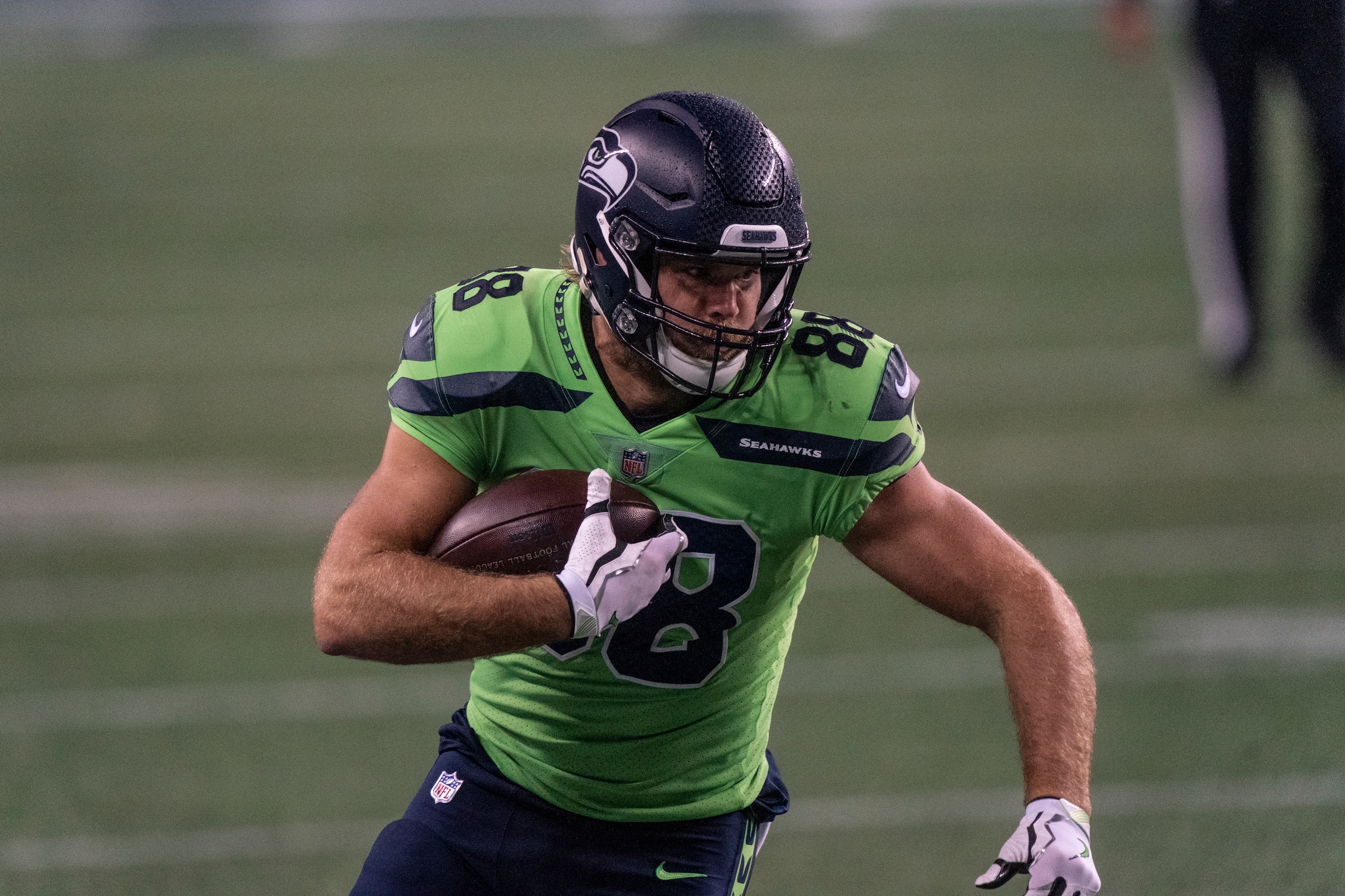 Seattle Seahawks tight end Greg Olsen runs with the during the second half of an NFL football game against the Minnesota Vikings, Sunday, Oct. 11, 2020, in Seattle. The Seahawks won 27-26. (AP Photo/Stephen Brashear) Seattle Seahawks tight end Greg Olsen runs with the during the second half of an NFL football game against the Minnesota Vikings, Sunday, Oct. 11, 2020, in Seattle. The Seahawks won 27-26. (AP Photo/Stephen Brashear)