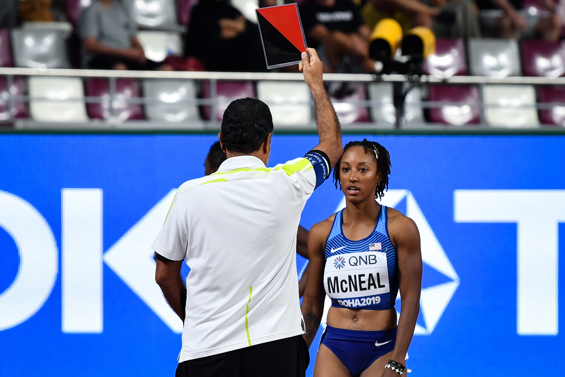 USA's Brianna Mcneal is disqualified during the Women's 100m Hurdles heats at the 2019 IAAF Athletics World Championships at the Khalifa International stadium in Doha on October 5, 2019. (Photo by ANDREJ ISAKOVIC / AFP) (Photo by ANDREJ ISAKOVIC/AFP via Getty Images)