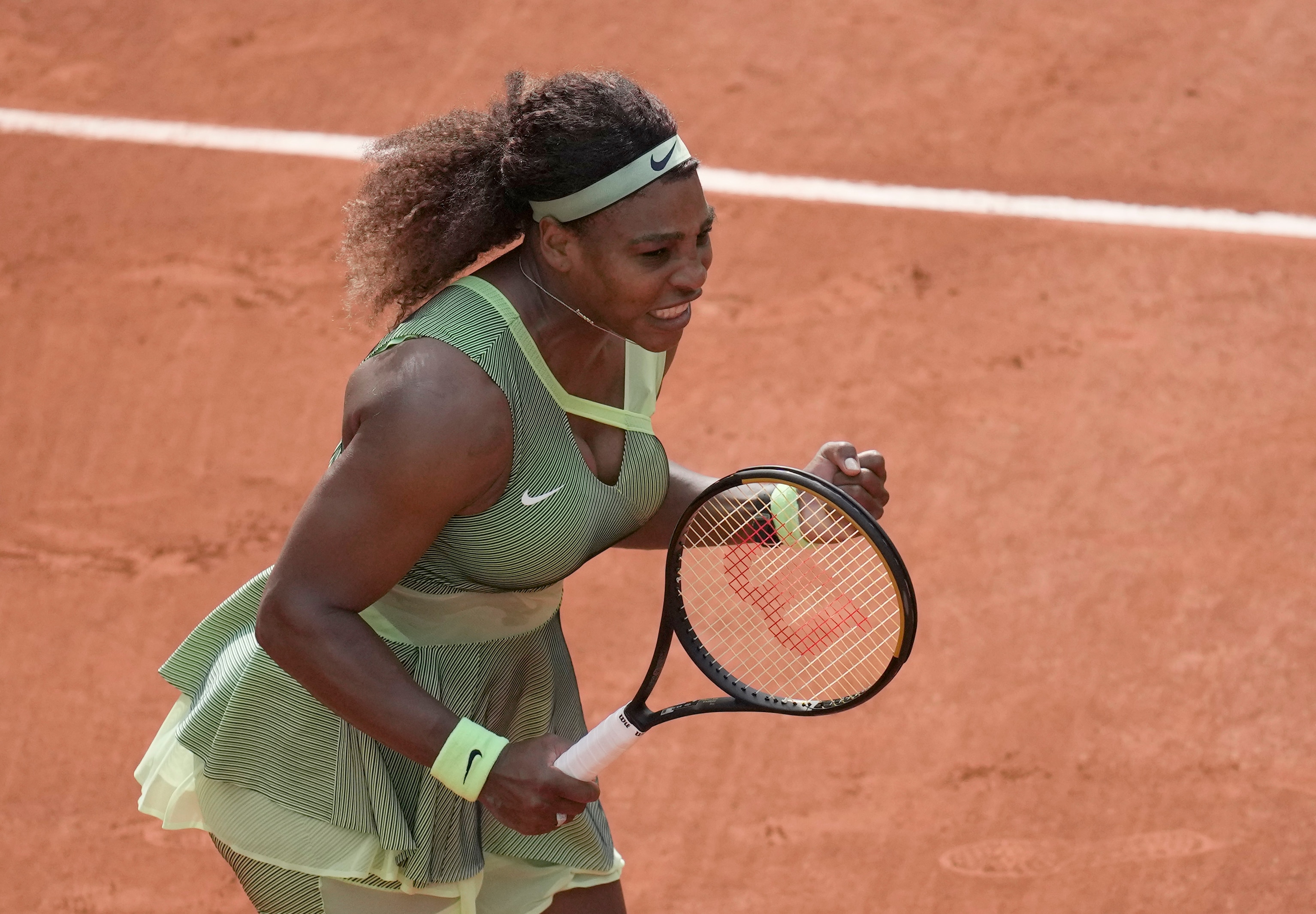 United States Serena Williams celebrates after defeating United States's Danielle Collins during their third round match on day 6, of the French Open tennis tournament at Roland Garros in Paris, France, Friday, June 4, 2021. (AP Photo/Christophe Ena)