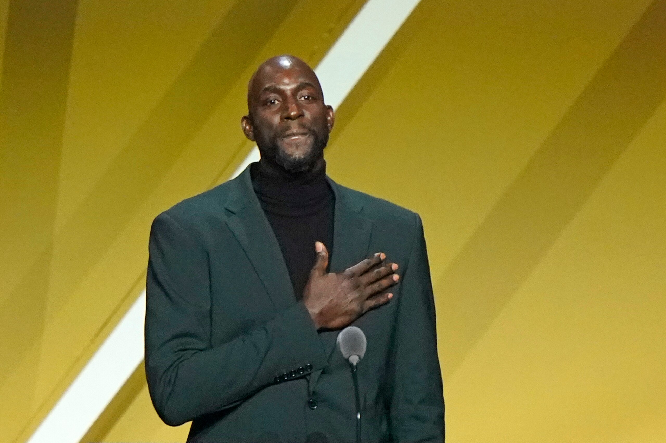 Kevin Garnett puts his hand on his heart during a speech during the 2020 Basketball Hall of Fame enshrinement ceremony, Saturday, May 15, 2021, in Uncasville, Conn. (AP Photo/Kathy Willens) Kevin Garnett puts his hand on his heart during a speech during the 2020 Basketball Hall of Fame enshrinement ceremony, Saturday, May 15, 2021, in Uncasville, Conn. (AP Photo/Kathy Willens)