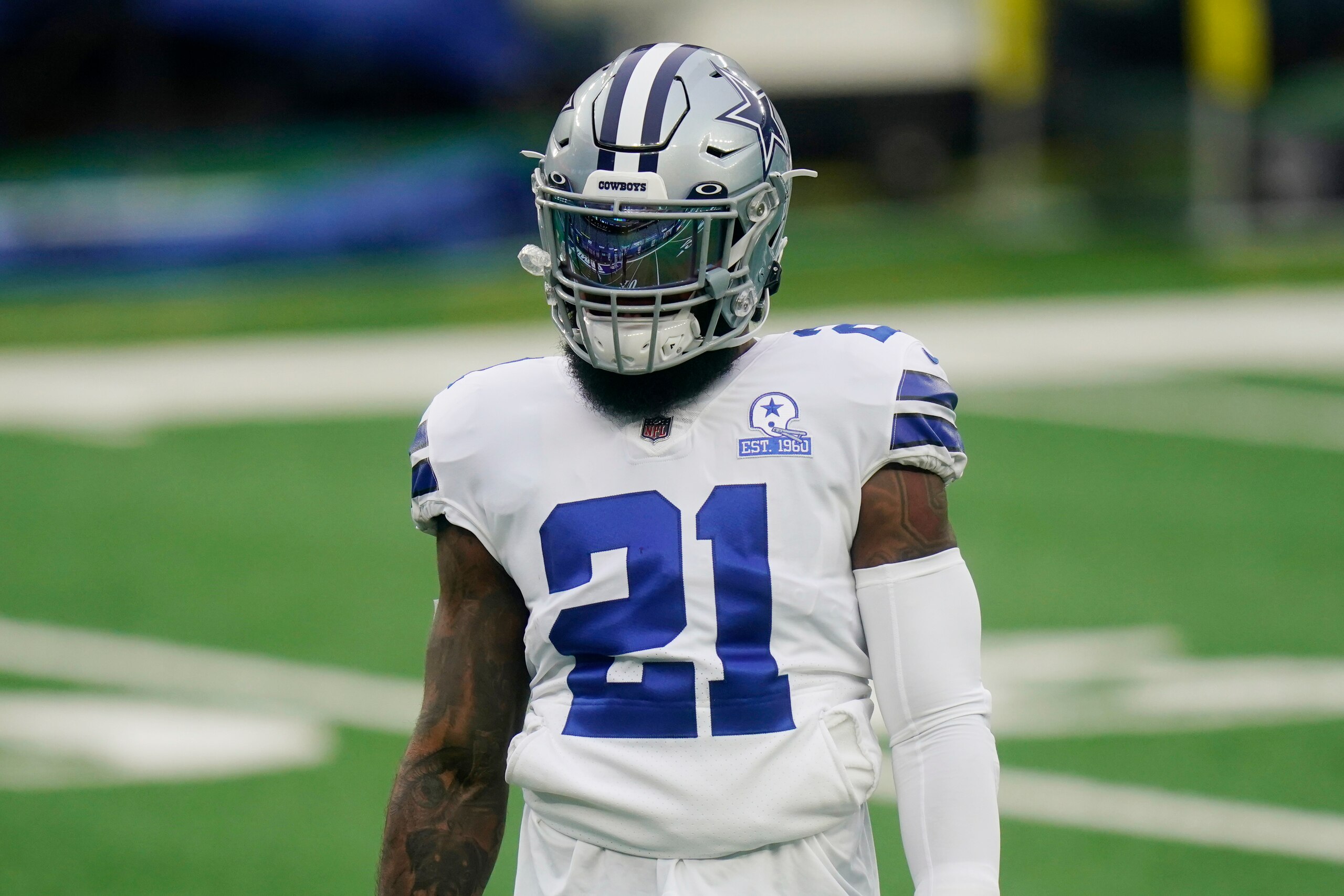 Dallas Cowboys' Ezekiel Elliott warms-up before an NFL football game against the New York Giants, Sunday, Jan. 3, 2021, in East Rutherford, N.J. (AP Photo/Frank Franklin II)