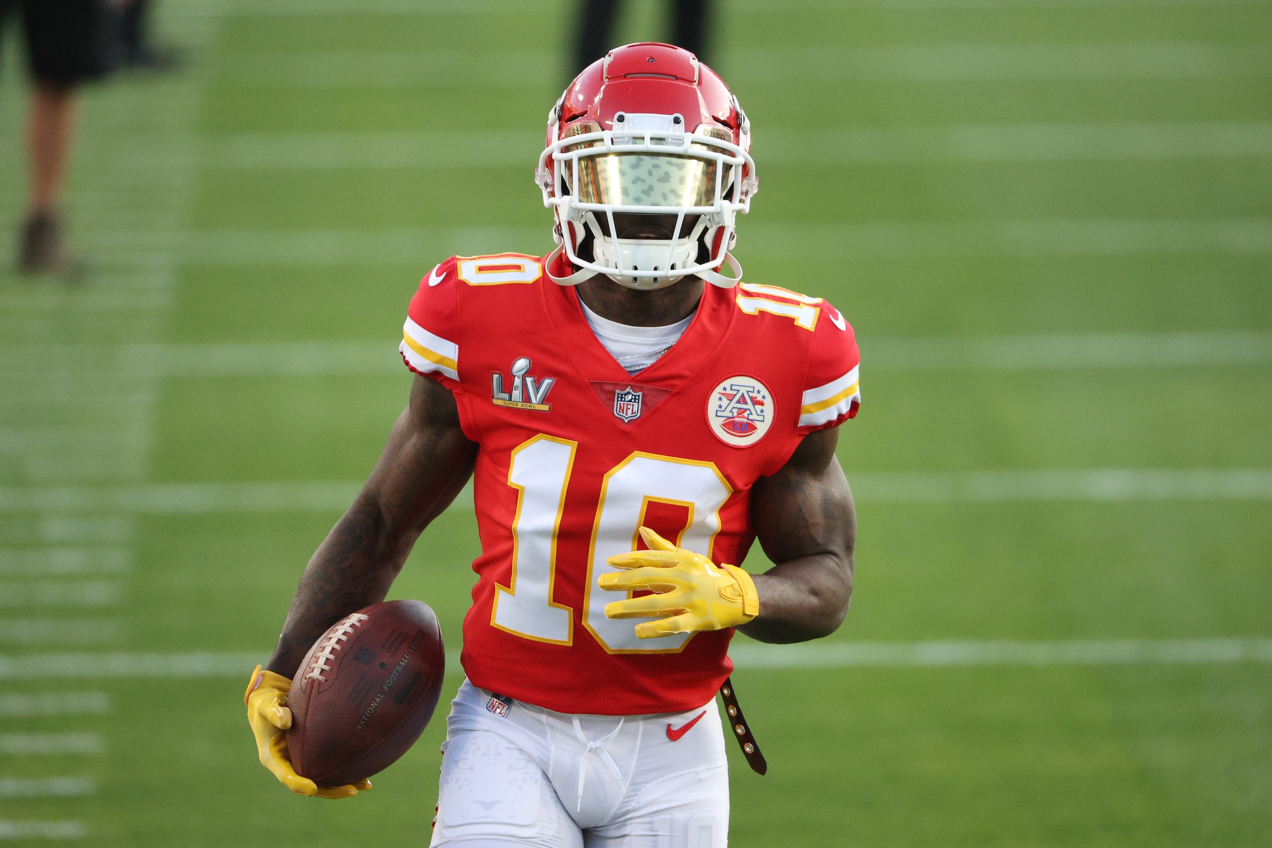 TAMPA, FLORIDA - FEBRUARY 07: Tyreek Hill #10 of the Kansas City Chiefs warms up before playing against the Tampa Bay Buccaneers in Super Bowl LV at Raymond James Stadium on February 07, 2021 in Tampa, Florida. (Photo by Patrick Smith/Getty Images)