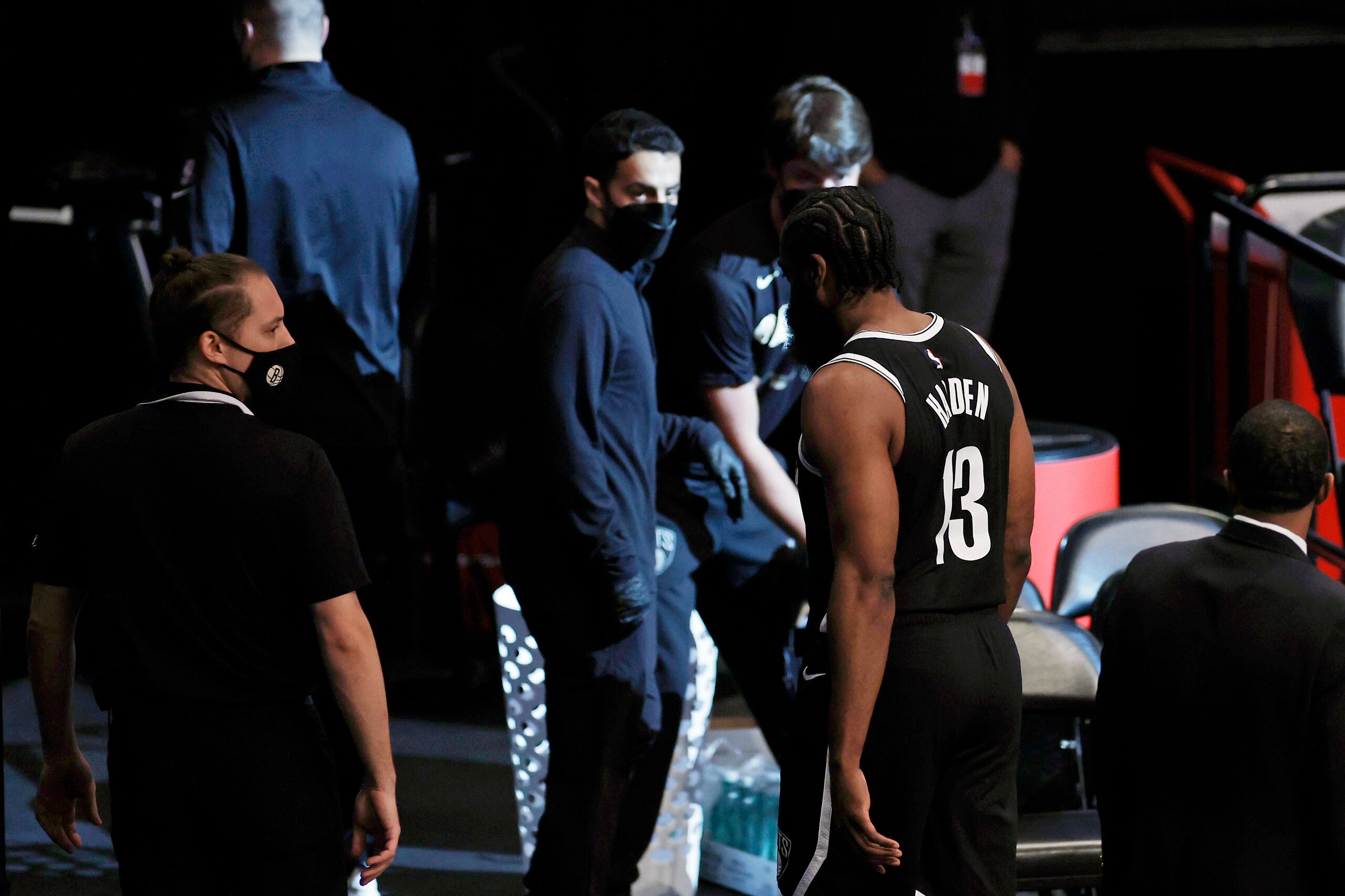 Brooklyn Nets guard James Harden (13) leaves the court early in the first quarter against the Milwaukee Bucks during Game 1 of an NBA basketball second-round playoff series Saturday, June 5, 2021, in New York. (AP Photo/Adam Hunger)
