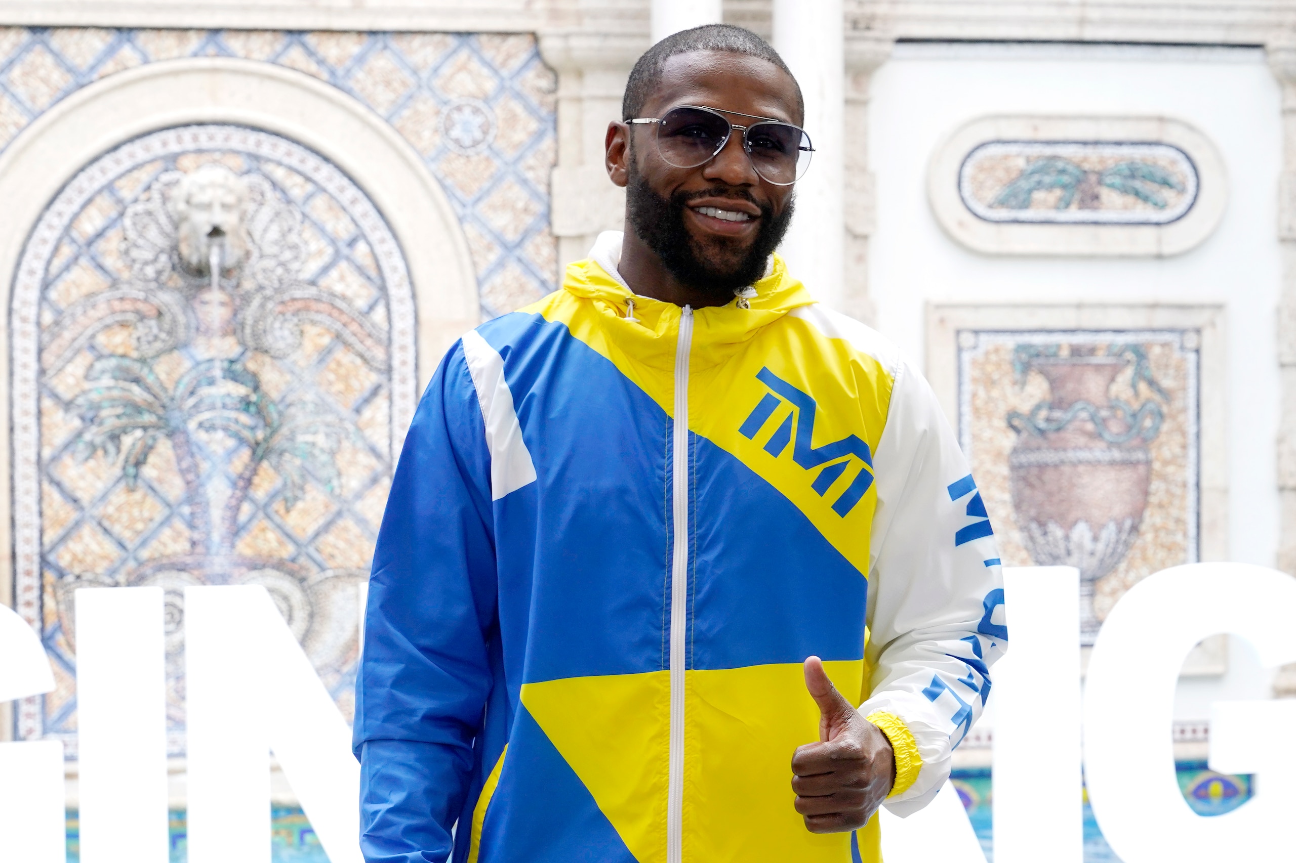 Floyd Mayweather poses for a photograph during a press event, Thursday, June 3, 2021, in Miami Beach, Fla. Mayweather will fight Logan Paul in an exhibition boxing match at the Hard Rock Stadium in Miami Gardens, Fla. Sunday. (AP Photo/Lynne Sladky)